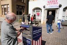 Restrictions on ballot drop off boxes in Georgia impact voters of colour, investigation finds 