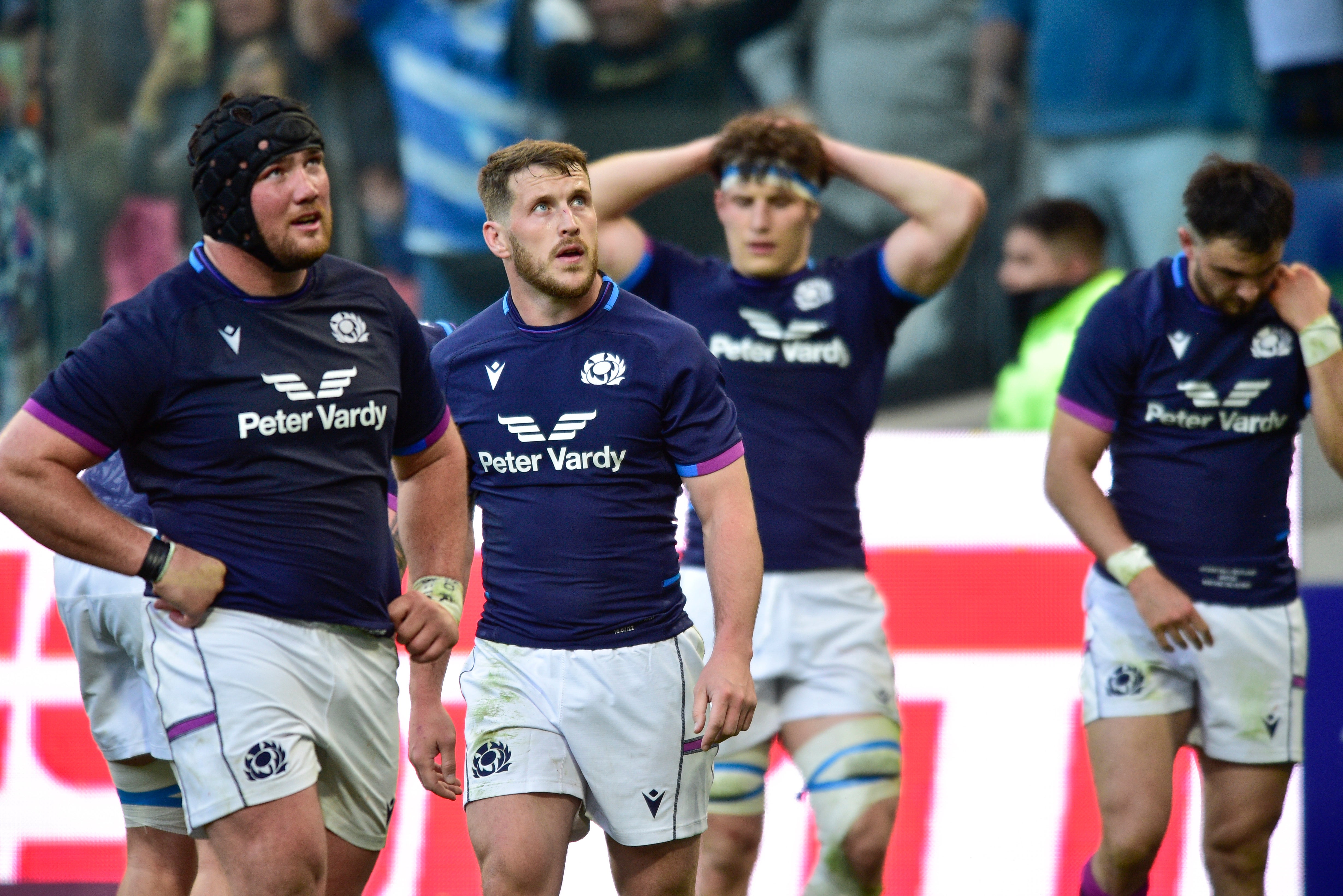 Scotland players react after losing the decider against Argentina (Gustavo Garello/AP)