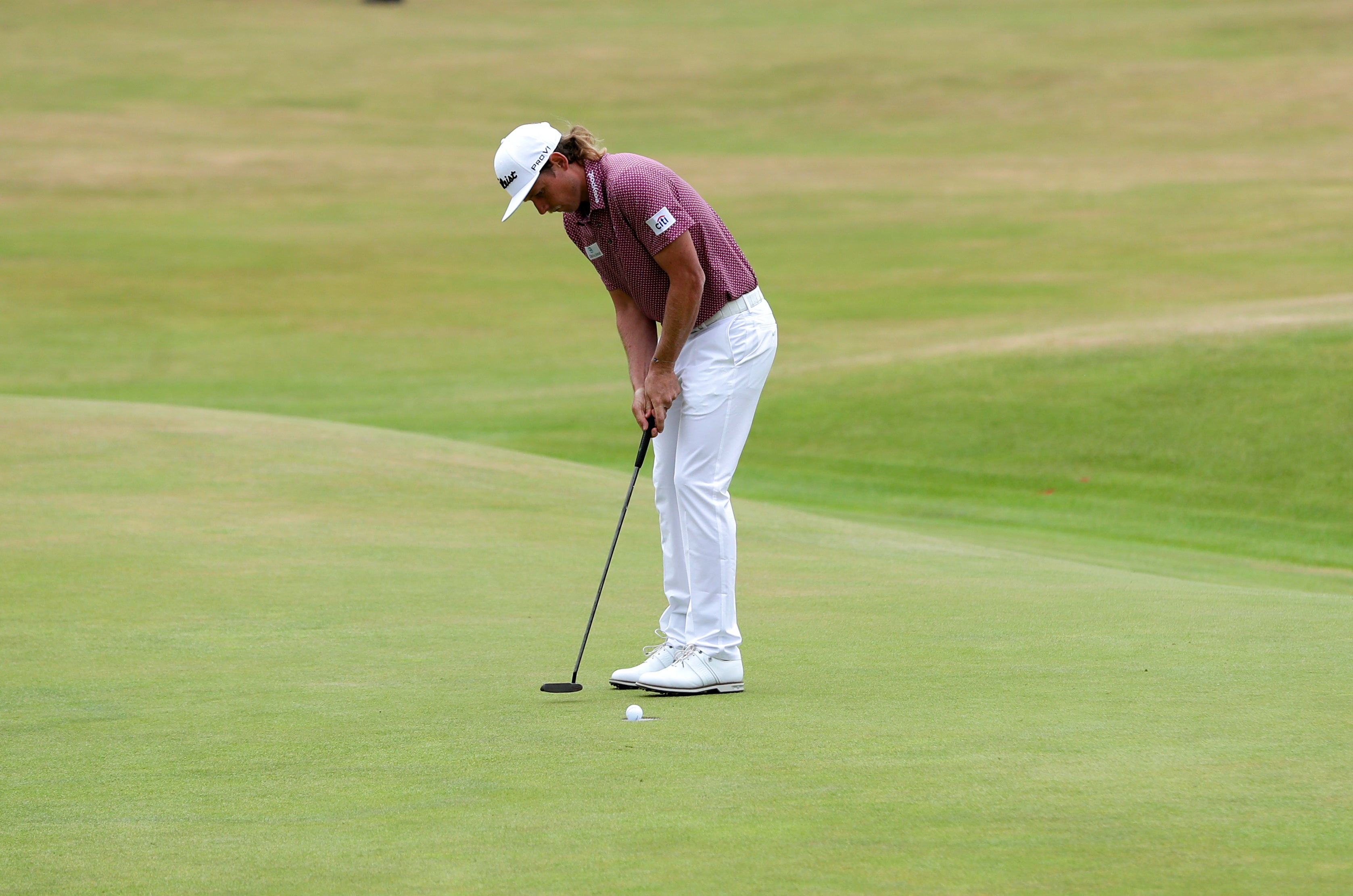 Australia’s Cameron Smith putts for his birdie on the 18th (Richard Sellers/PA)