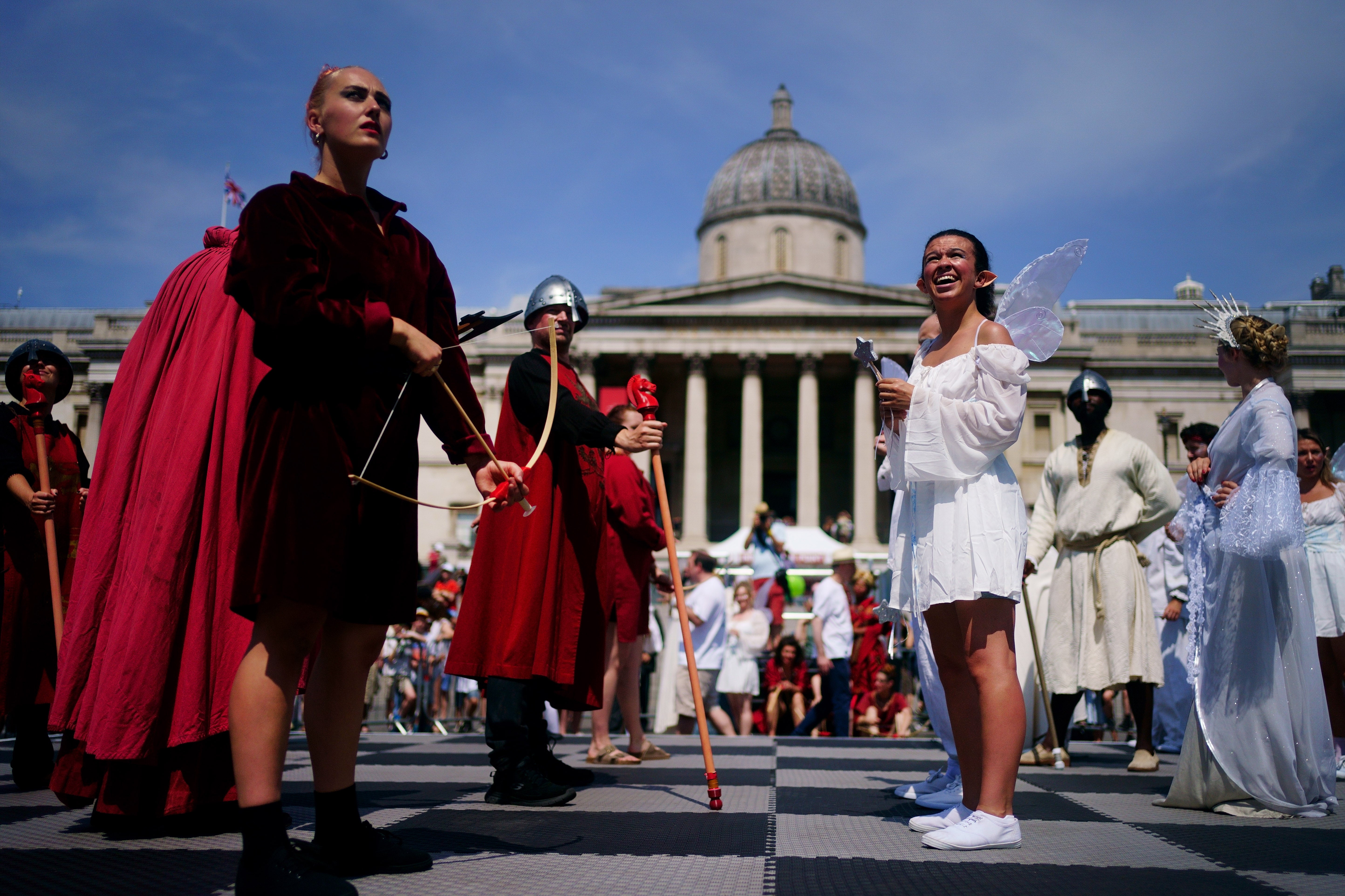 A living chess set, with 32 professional actors taking on the role of the chess pieces, take part in ChessFest, the UK’s largest one-day chess event, at Trafalgar Square, central London. Picture date: Sunday July 17, 2022.