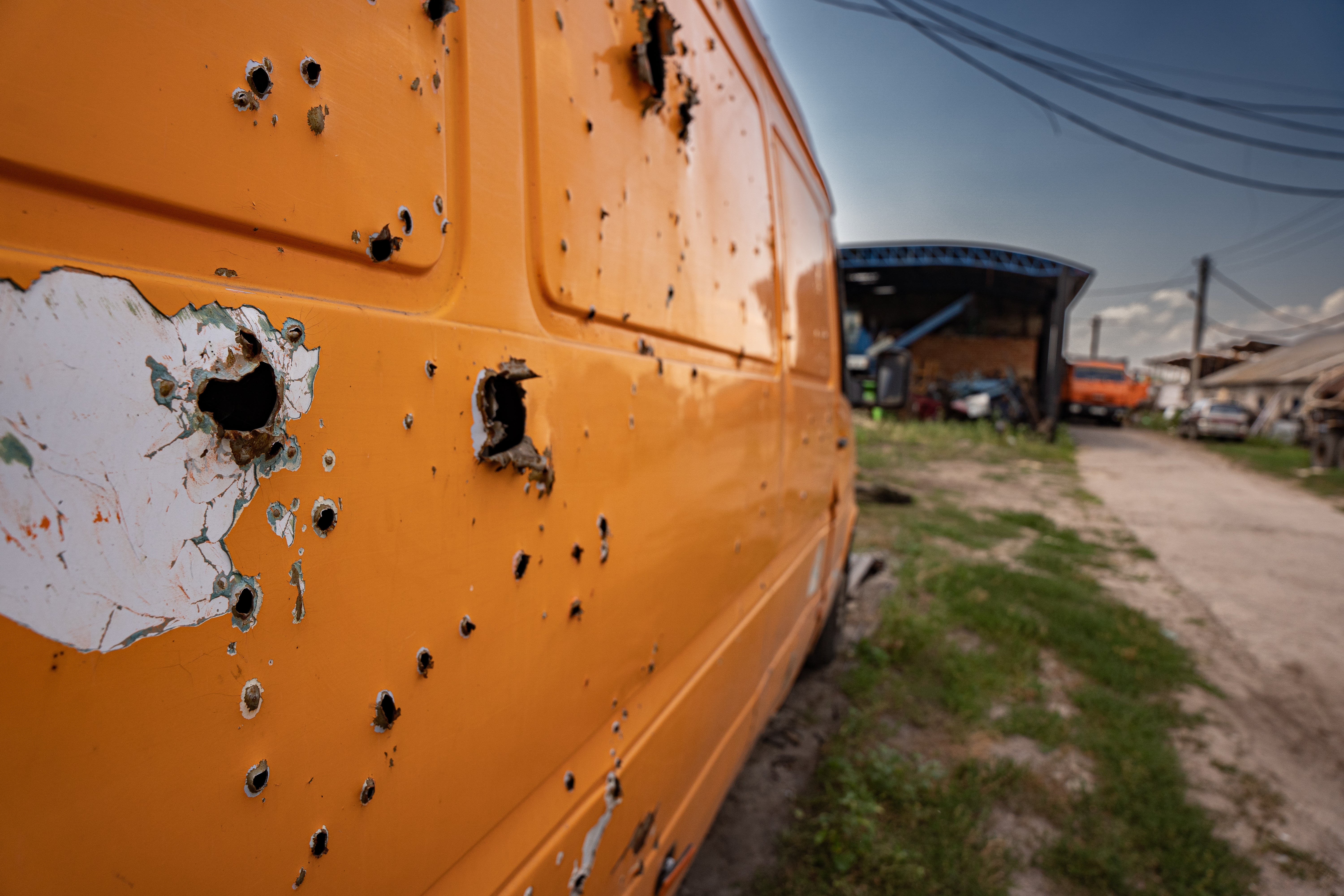 A minibus on Lubov Zlobina’s farm in Kharkiv was used as target practice by Russian soldiers, she says