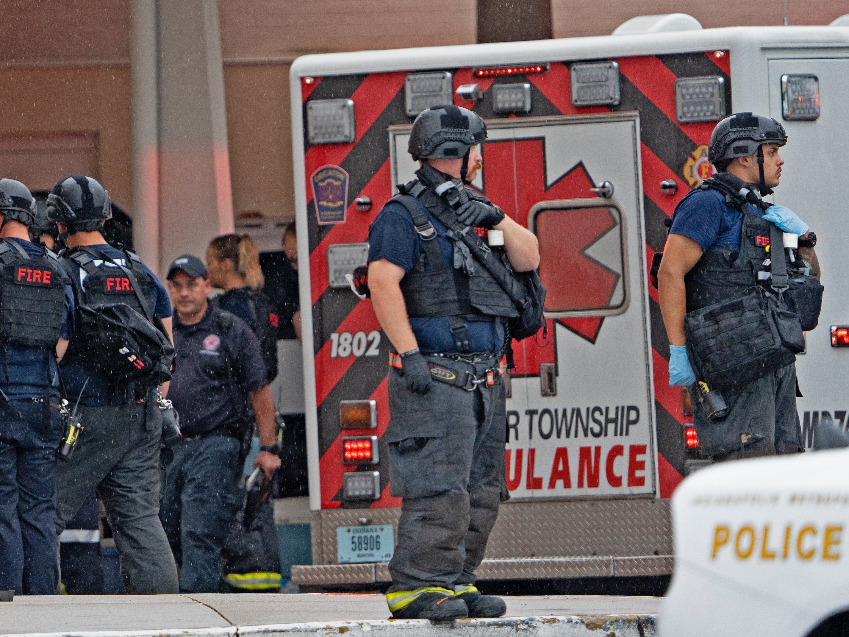 Emergency responders at the scene of a shooting at Greenwood Park Mall, Indiana