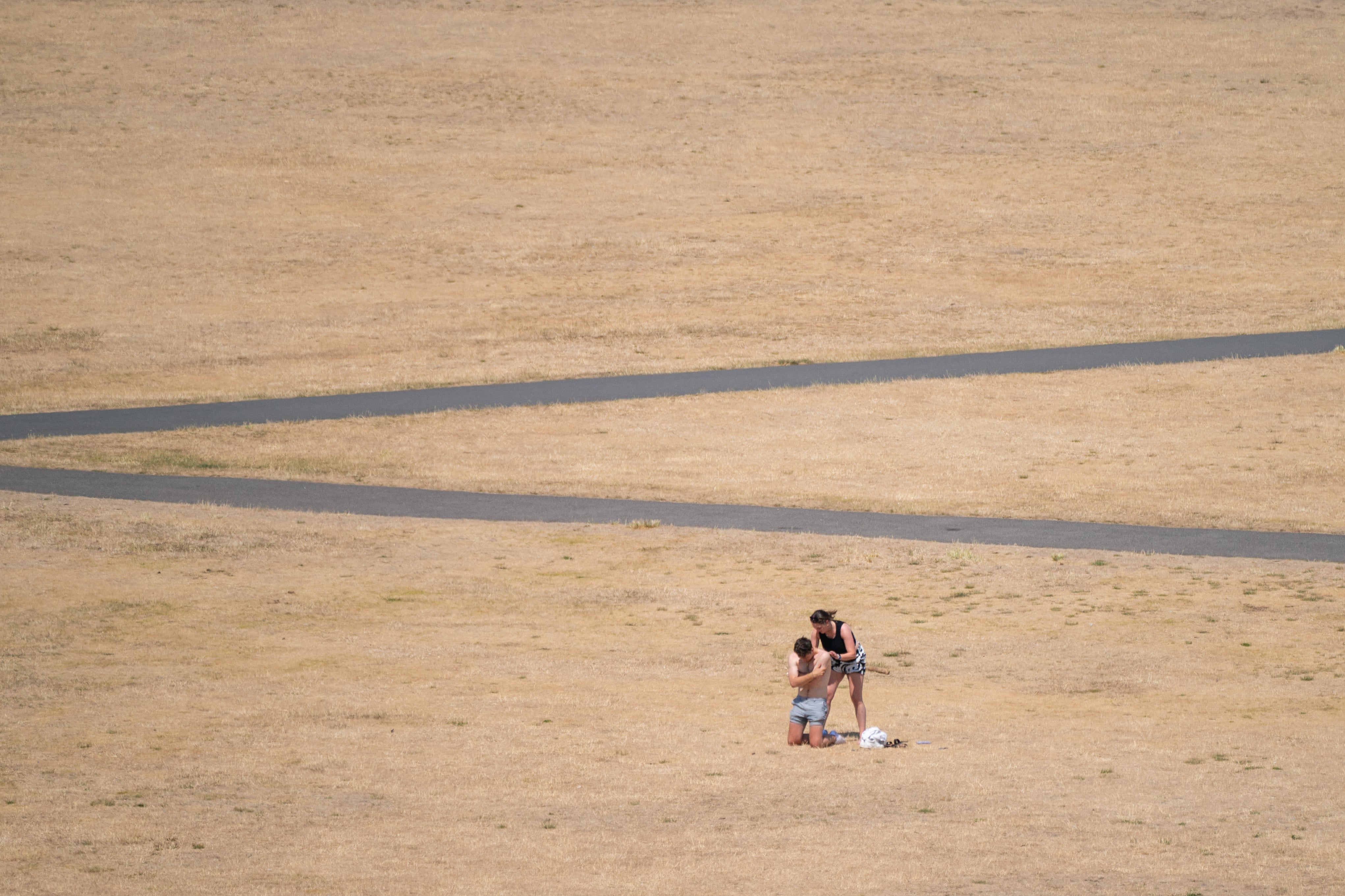 People are being warned not to exercise during the heatwave (Dominic Lipinski/PA)