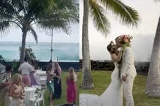 Newlyweds describe ‘huge wall’ of wave that hit Hawaii wedding: ‘The cake luckily made it’