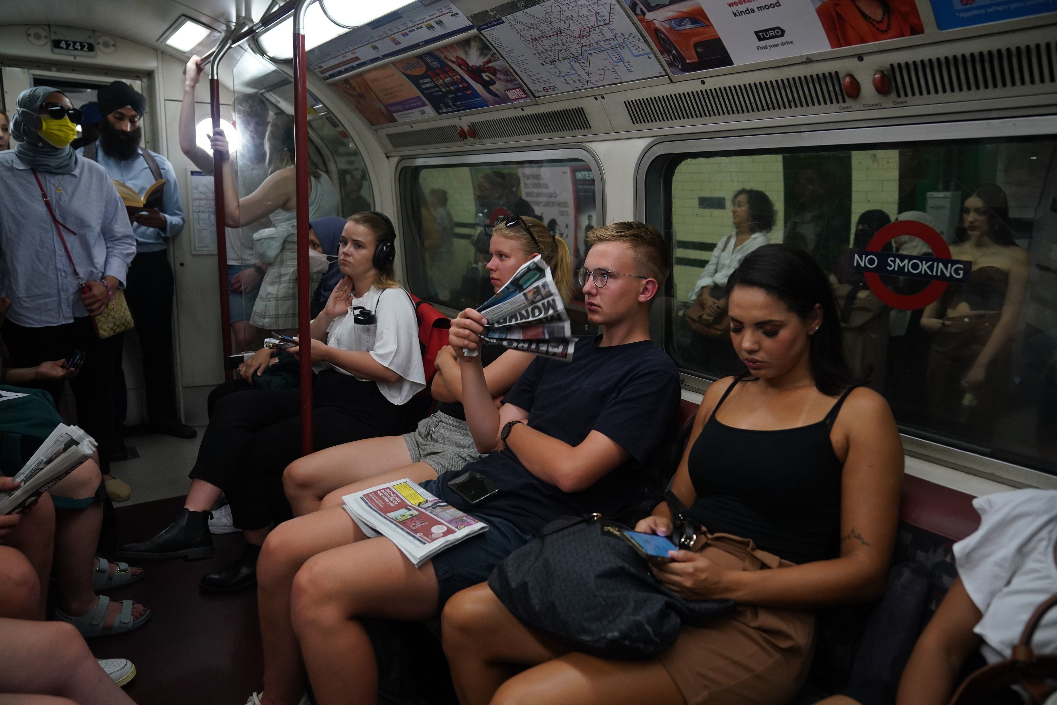 Commuters suffer in extreme heat on the London Underground on Monday