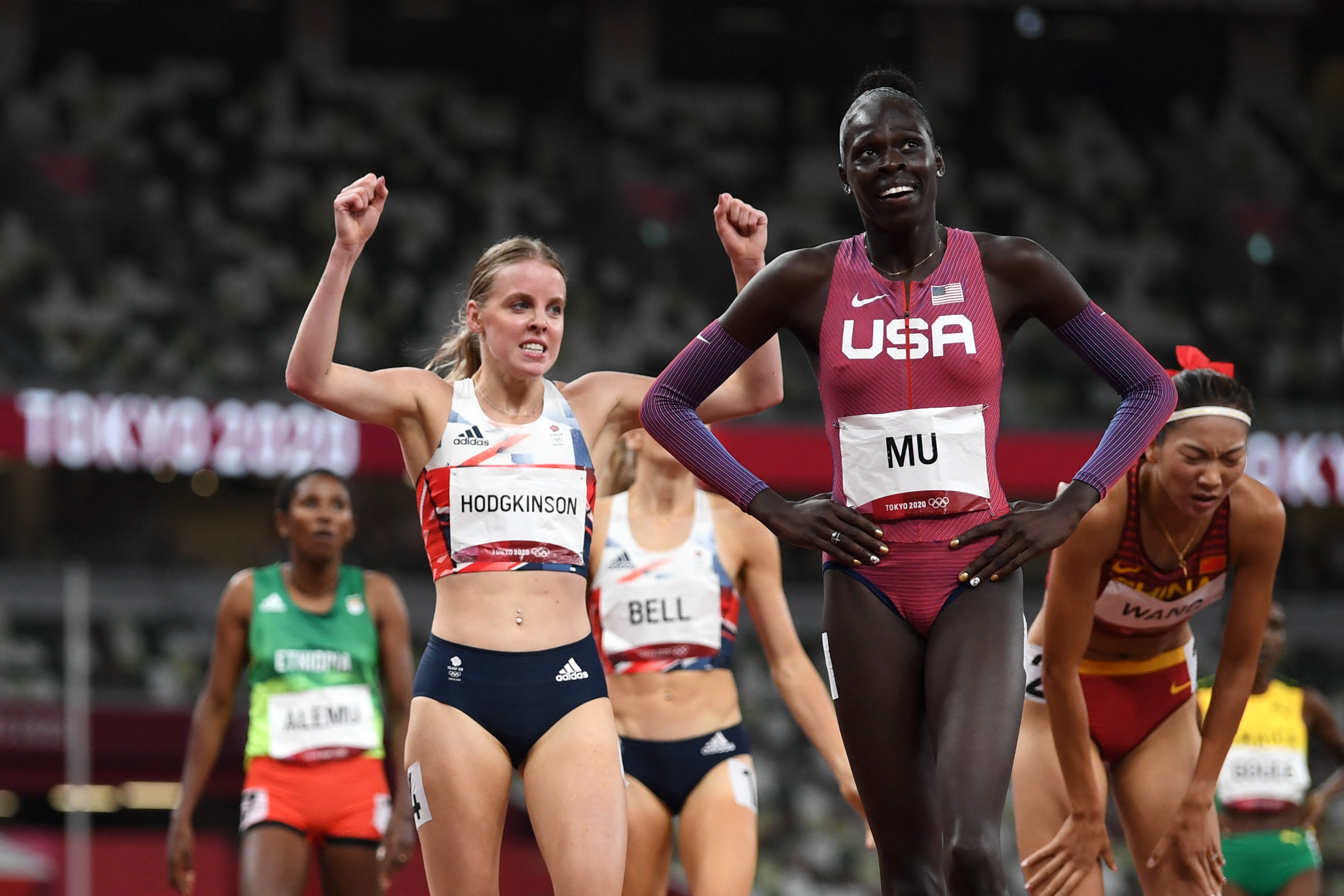 Athing Mu and Keely Hodgkinson after crossing the line in Tokyo