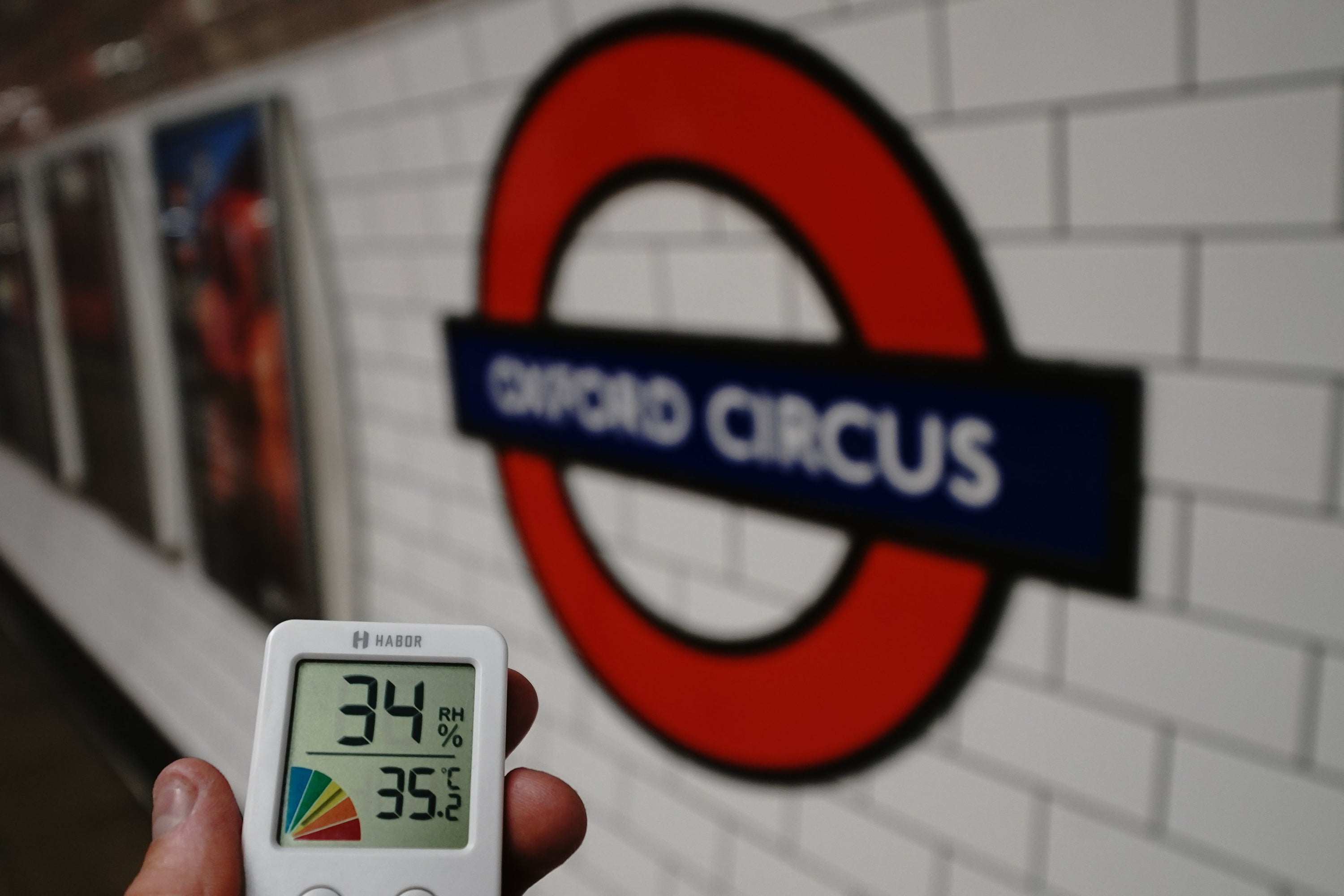 A digital thermometer displaying a temperature of 34 degrees celsius at Oxford Circus station on Monday