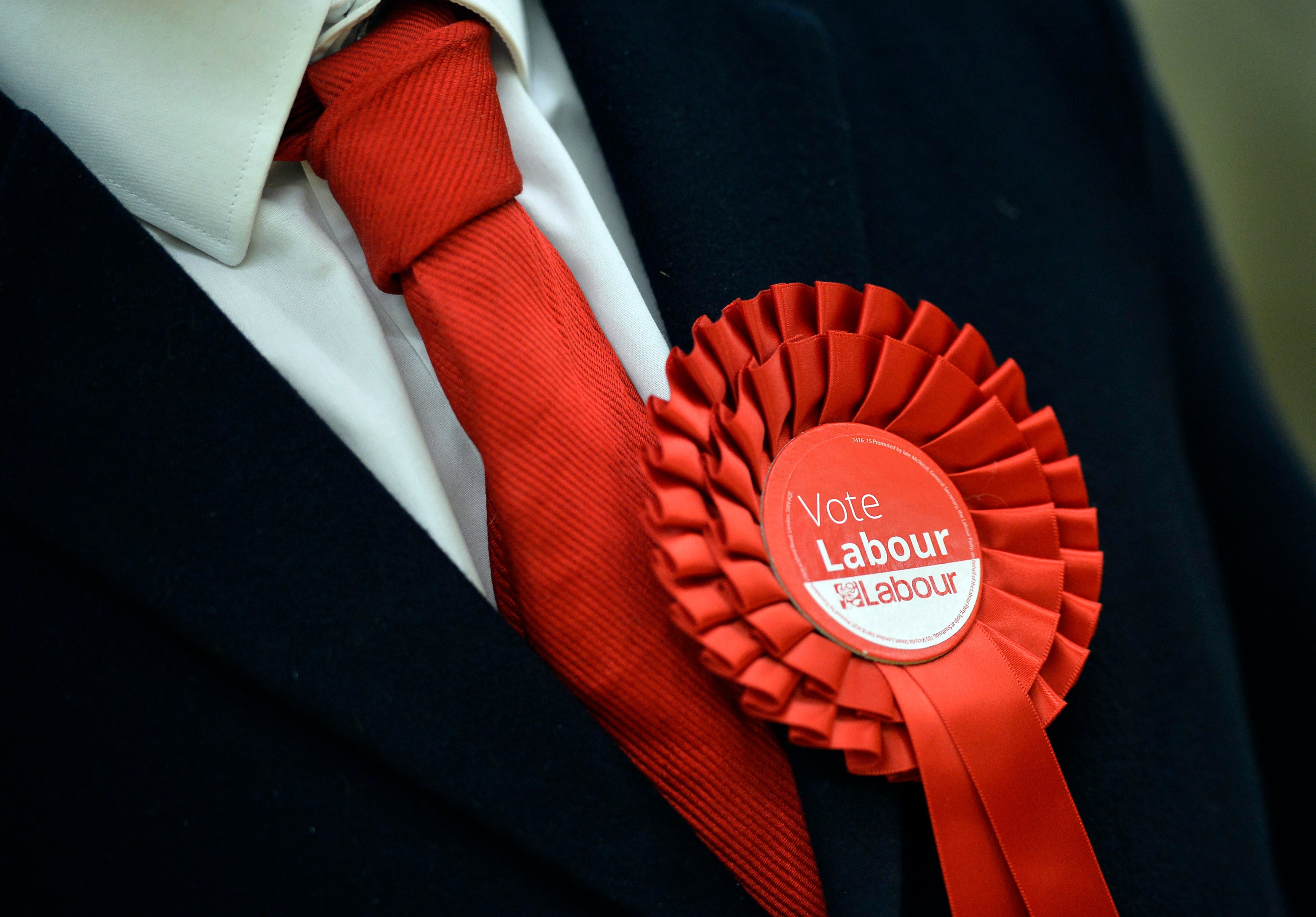 Labour rosette (Hannah McKays/PA)