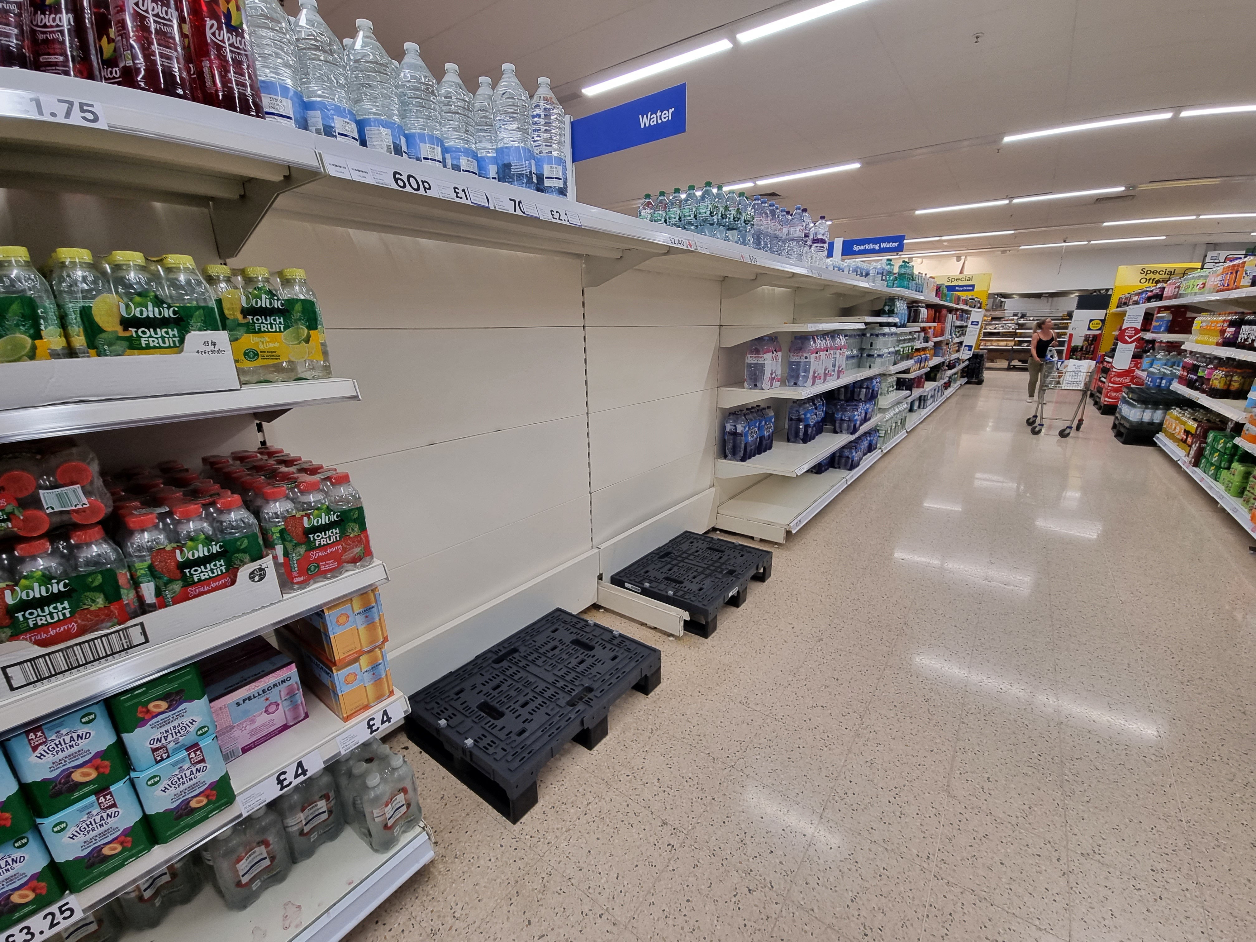 Empty water shelves were seen at Tesco in Clevedon, Somerset as the UK prepared for another day of hot weather