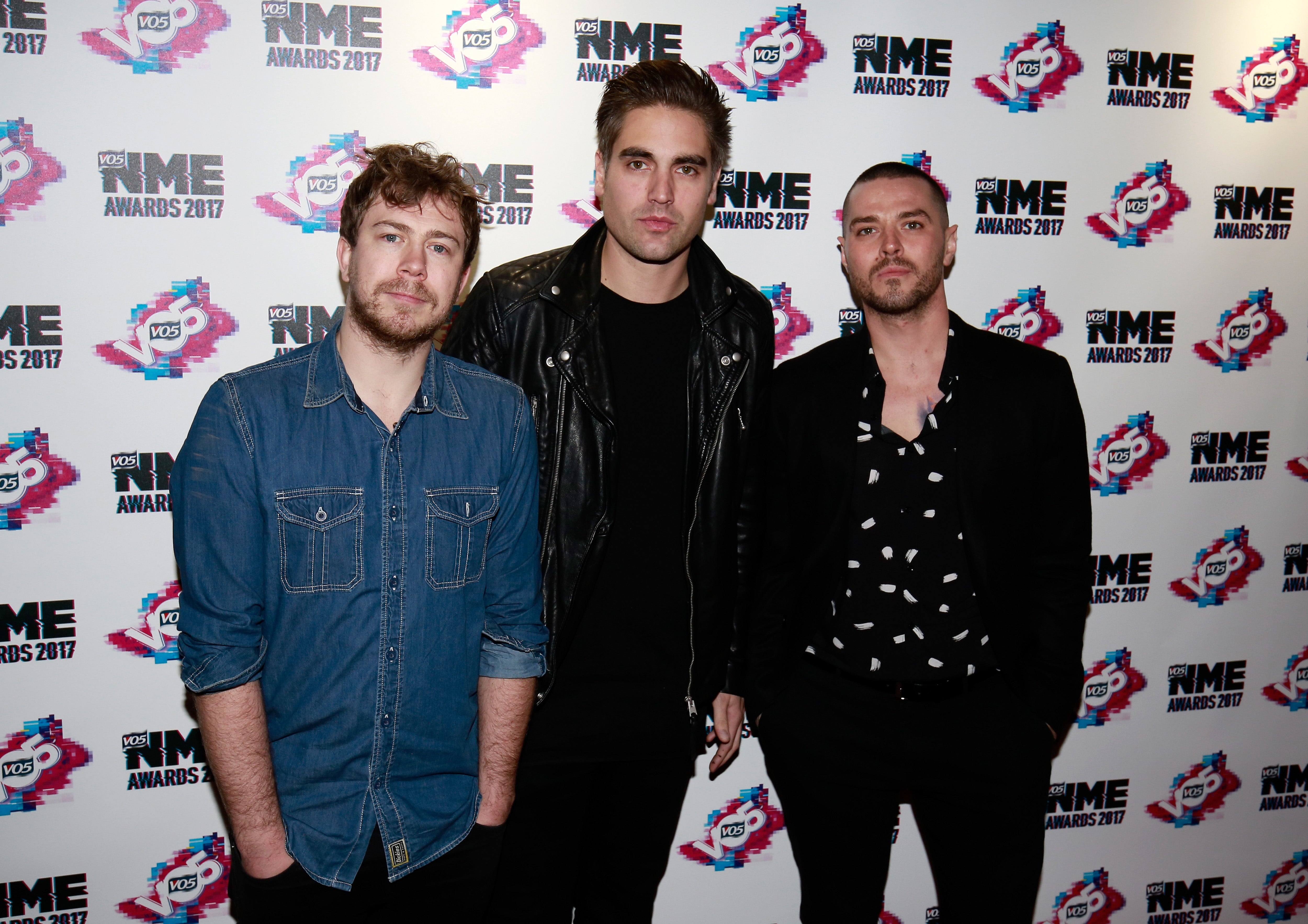 Charlie Simpson (centre) with his Busted bandmates at VO5 NME Awards