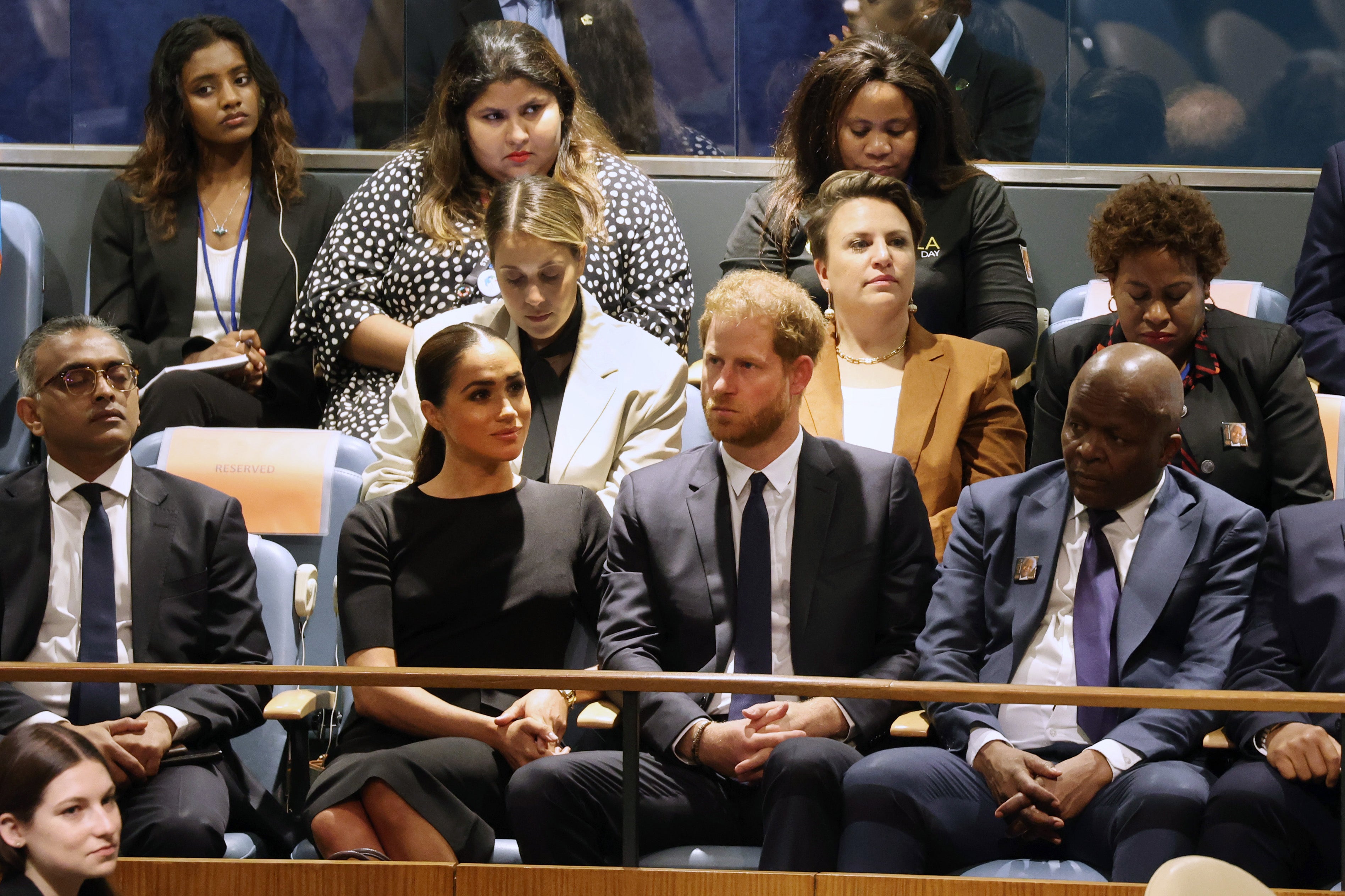 Prince Harry, Duke of Sussex sits with his wife Meghan, Duchess of Sussex, before he addresses the United Nations General Assembly