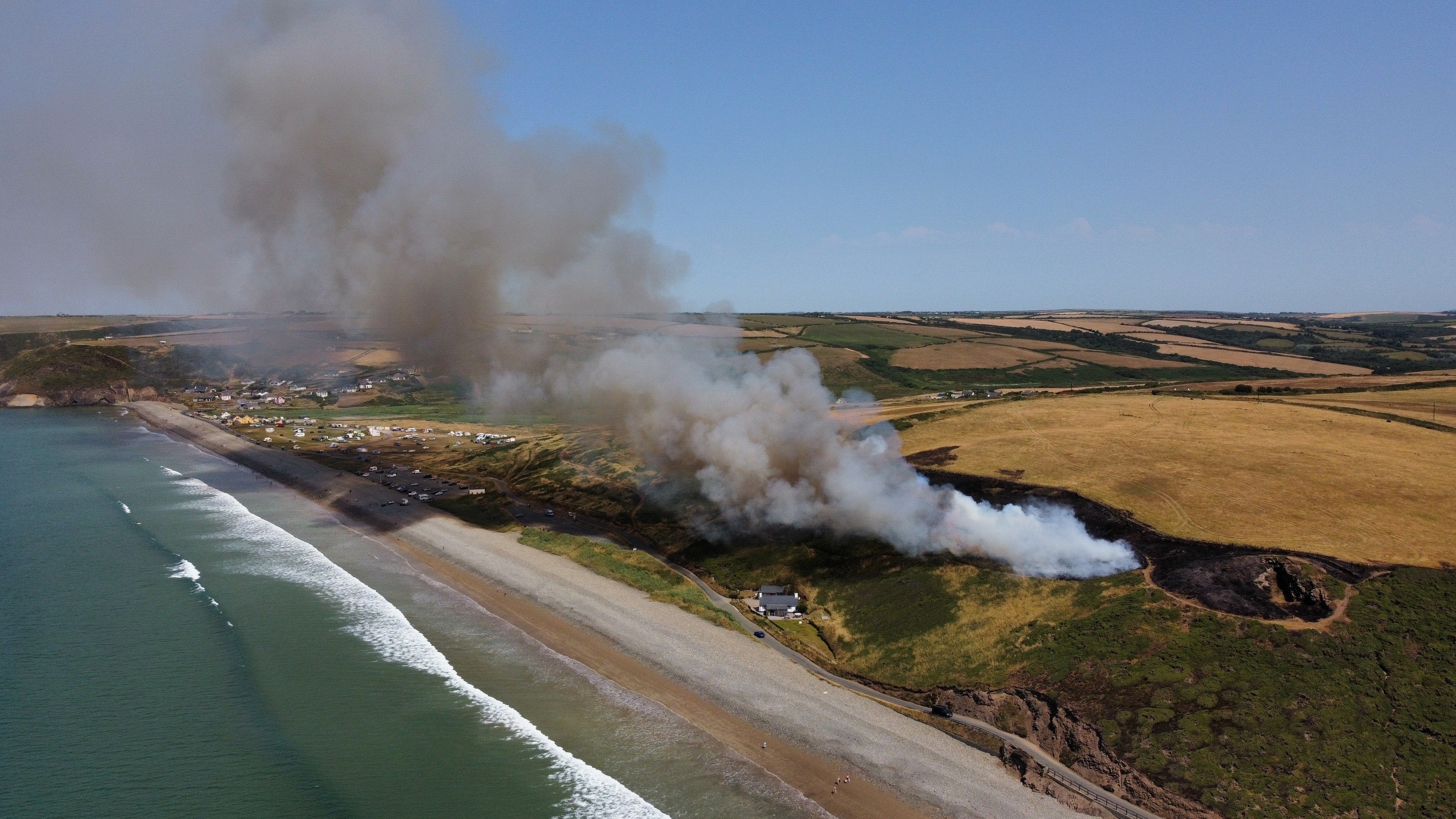 Drone photos show a large fire above blue flag beach in Pembrokeshire