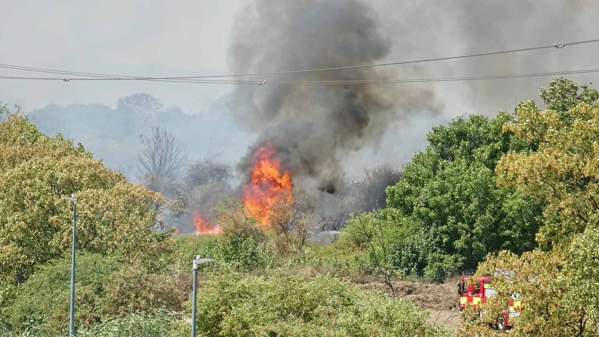 Firefighters attend a fire on Dartford Marshes in Kent (Adrian Stirrup/PA)