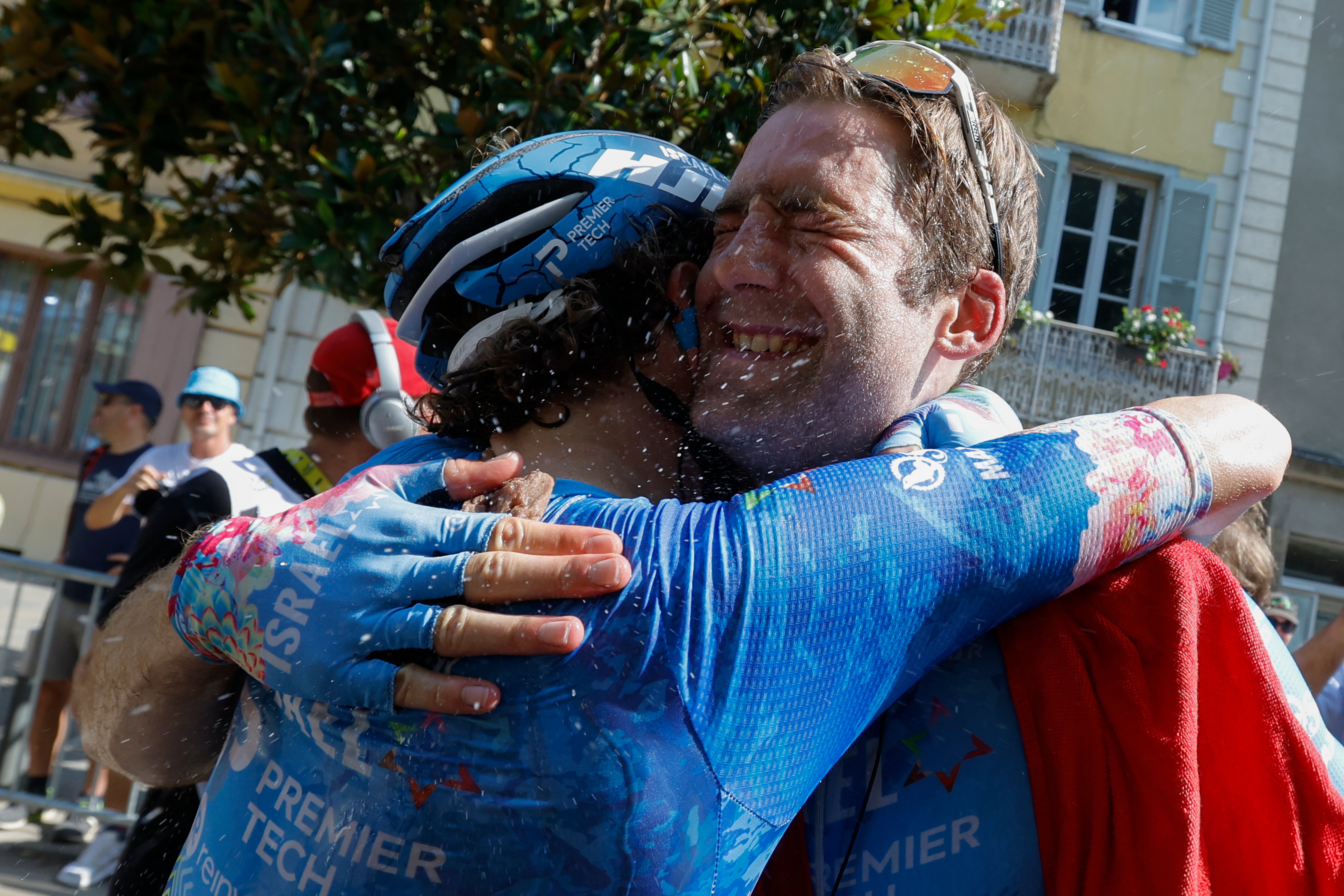 Houle, right, took an emotional stage win on stage 16 of the Tour de France