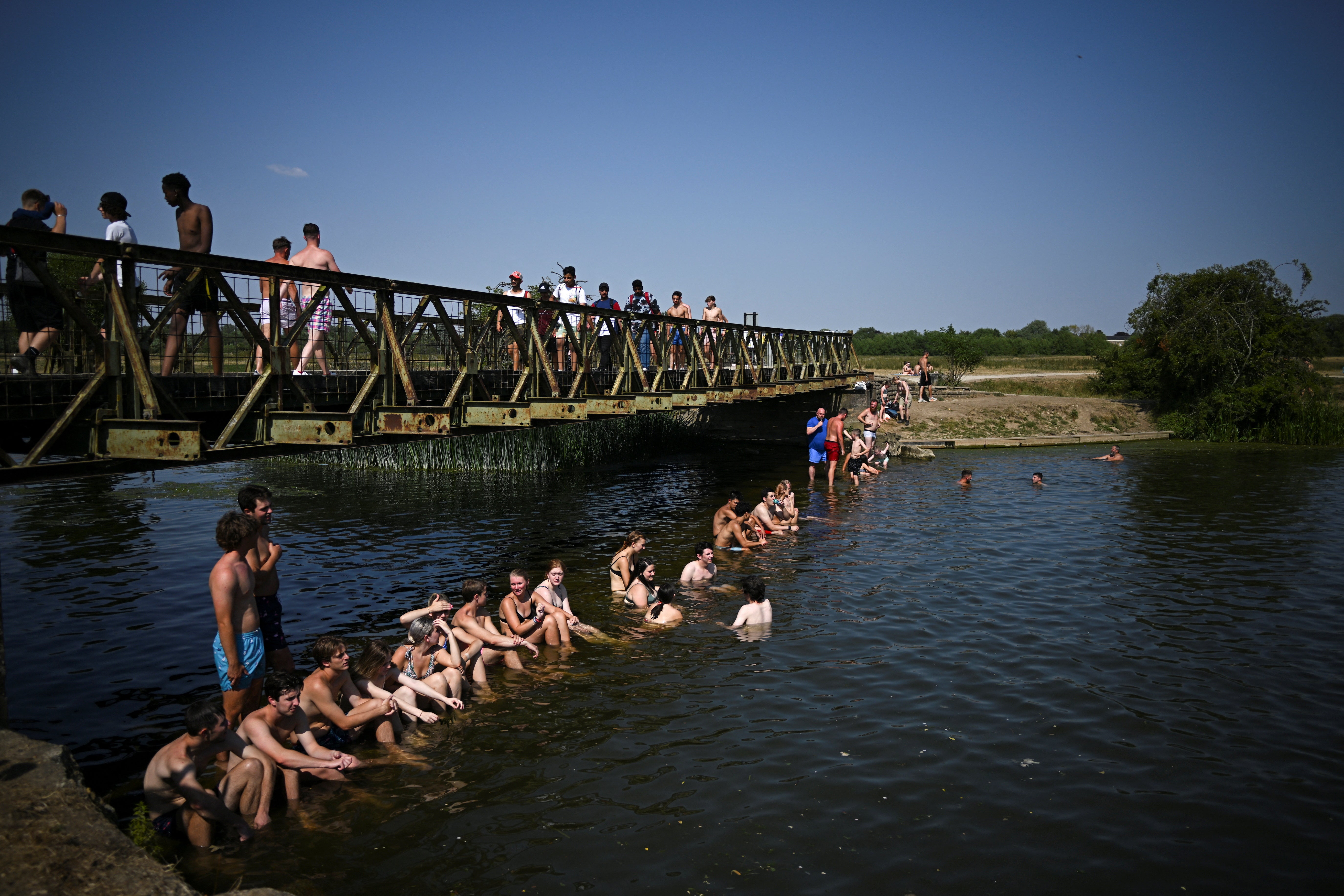 Bathers cool down in the River Thames in Oxford on Monday