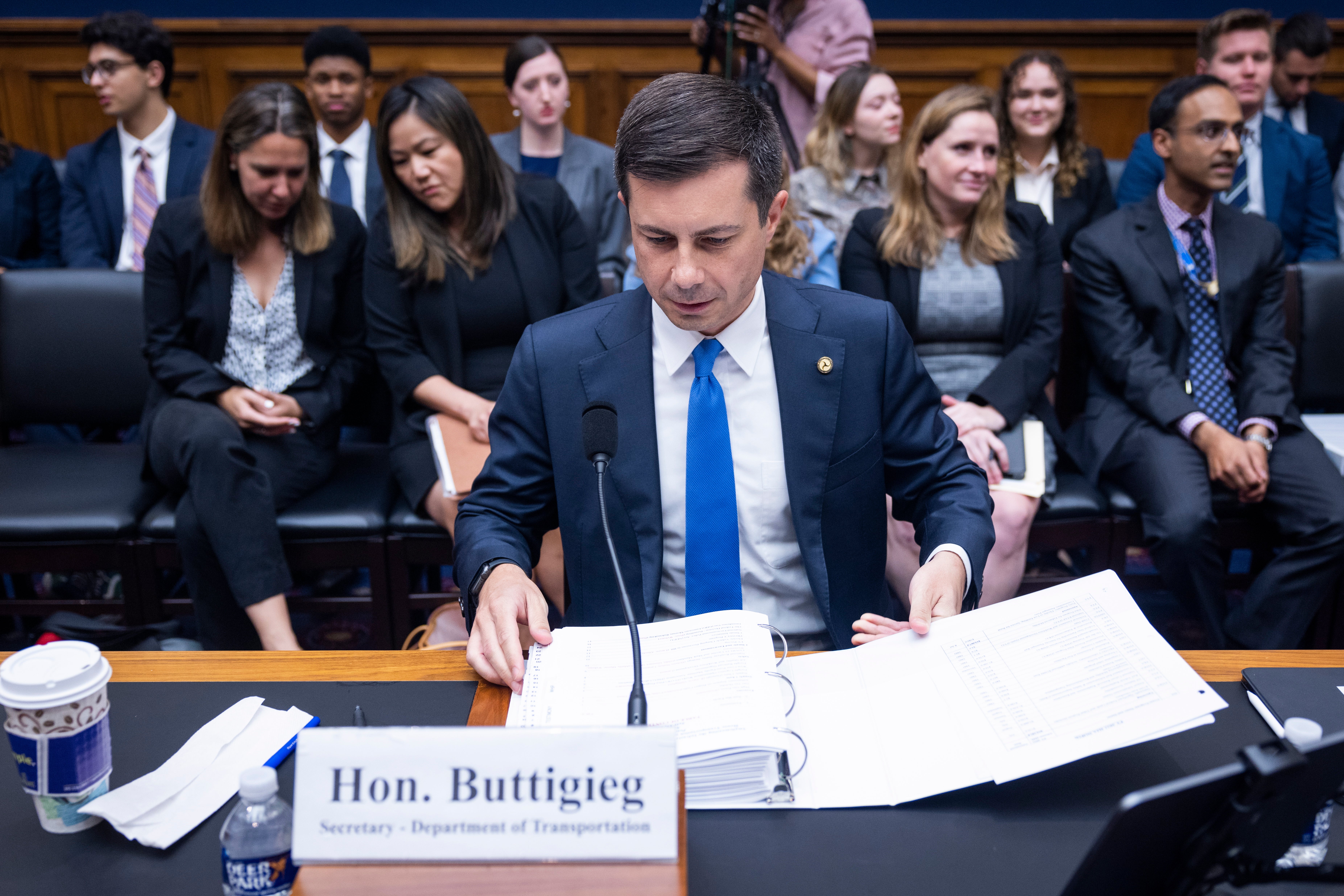 Transportation Secretary Pete Buttigieg prepares to testify before the House Transportation and Infrastructure Committee