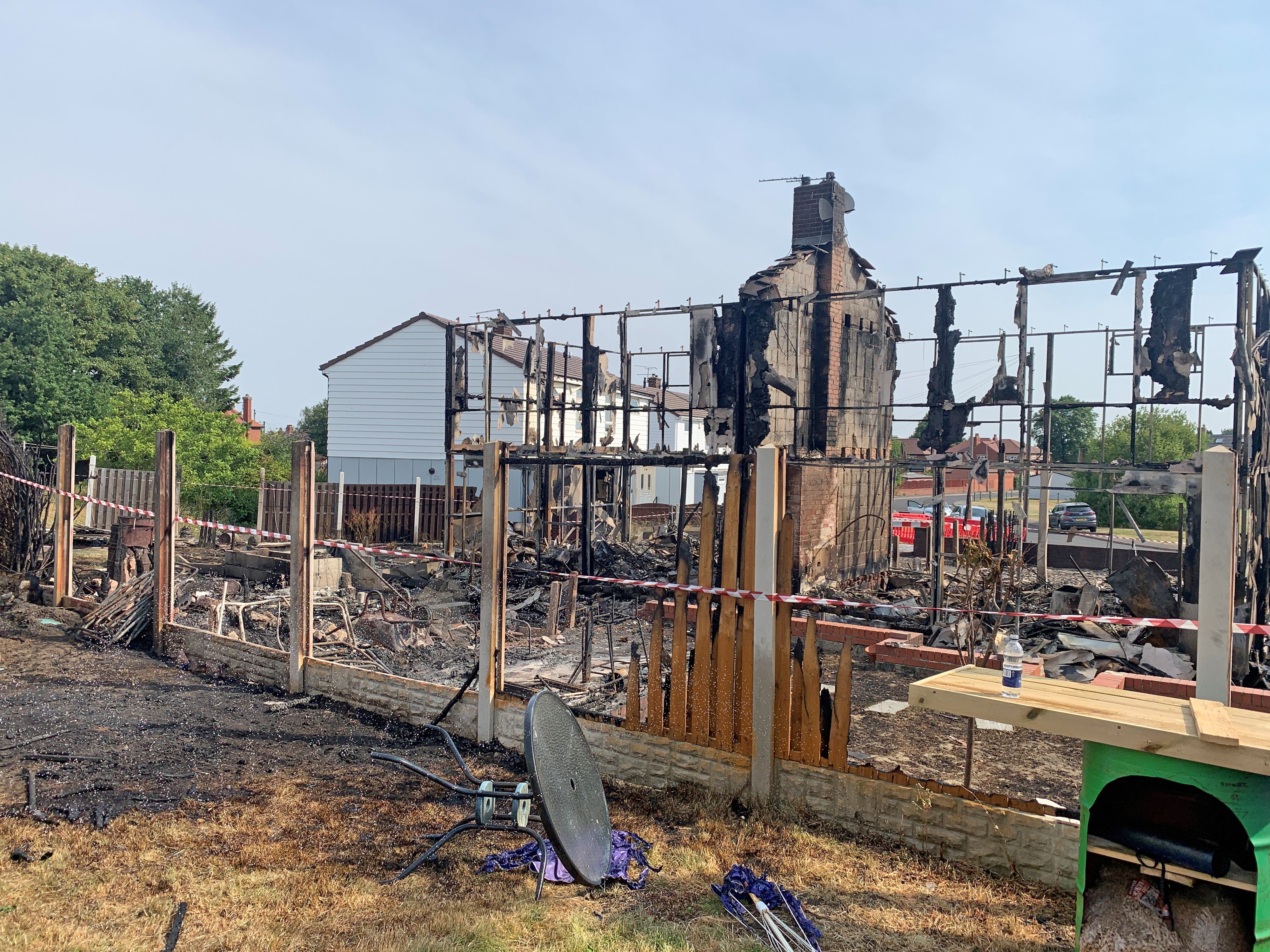 The scene after a blaze in Barnsley, South Yorkshire, after temperatures topped 40C in the UK for the first time (Dave Higgens/PA)