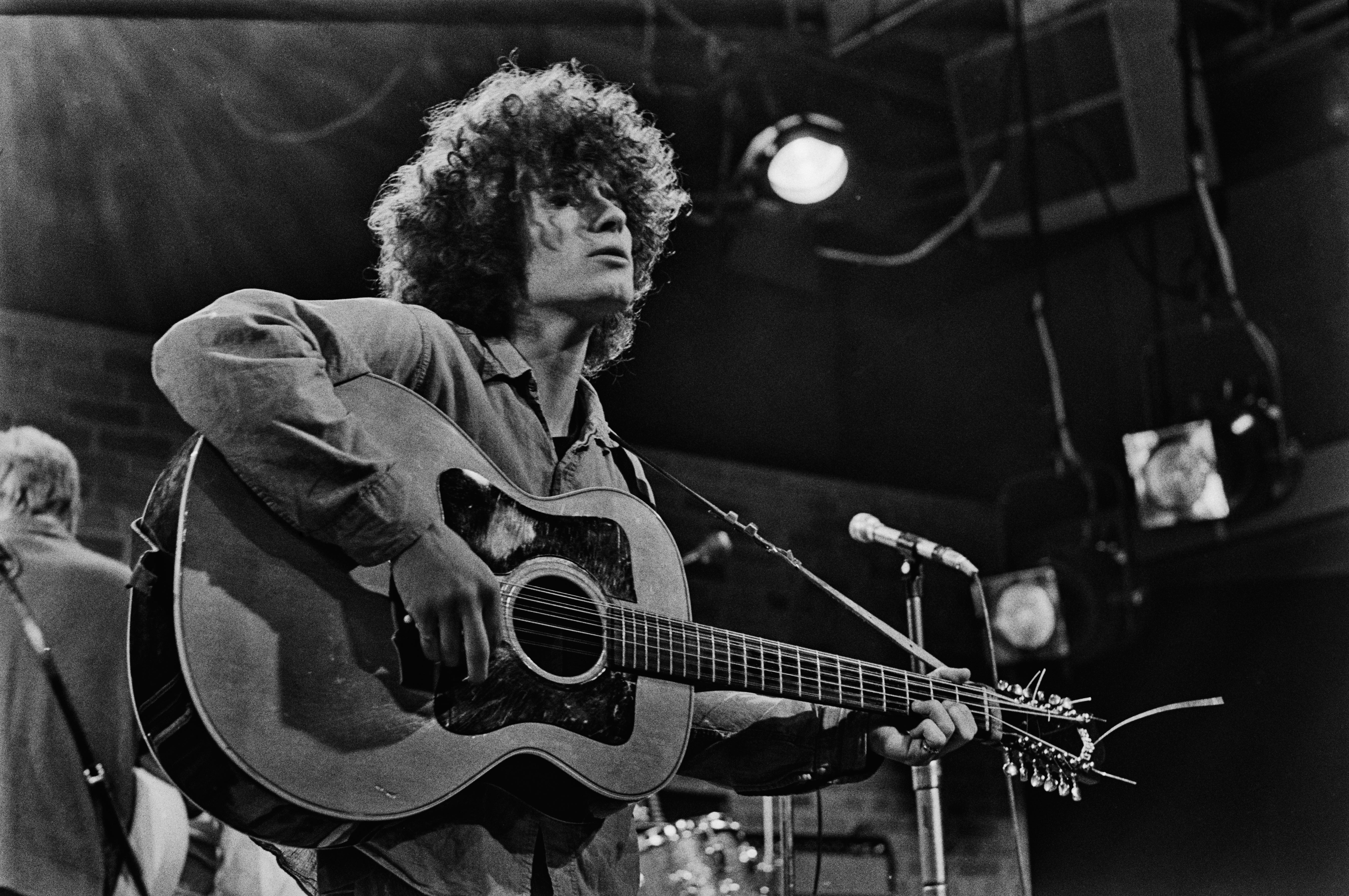 Buckley strode on, 12-string in hand, perched on a beat-up car and picked out the notes of an exquisite song, then unrecorded