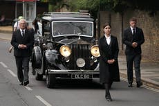 Dame Deborah James’ coffin carried by husband and son during private funeral