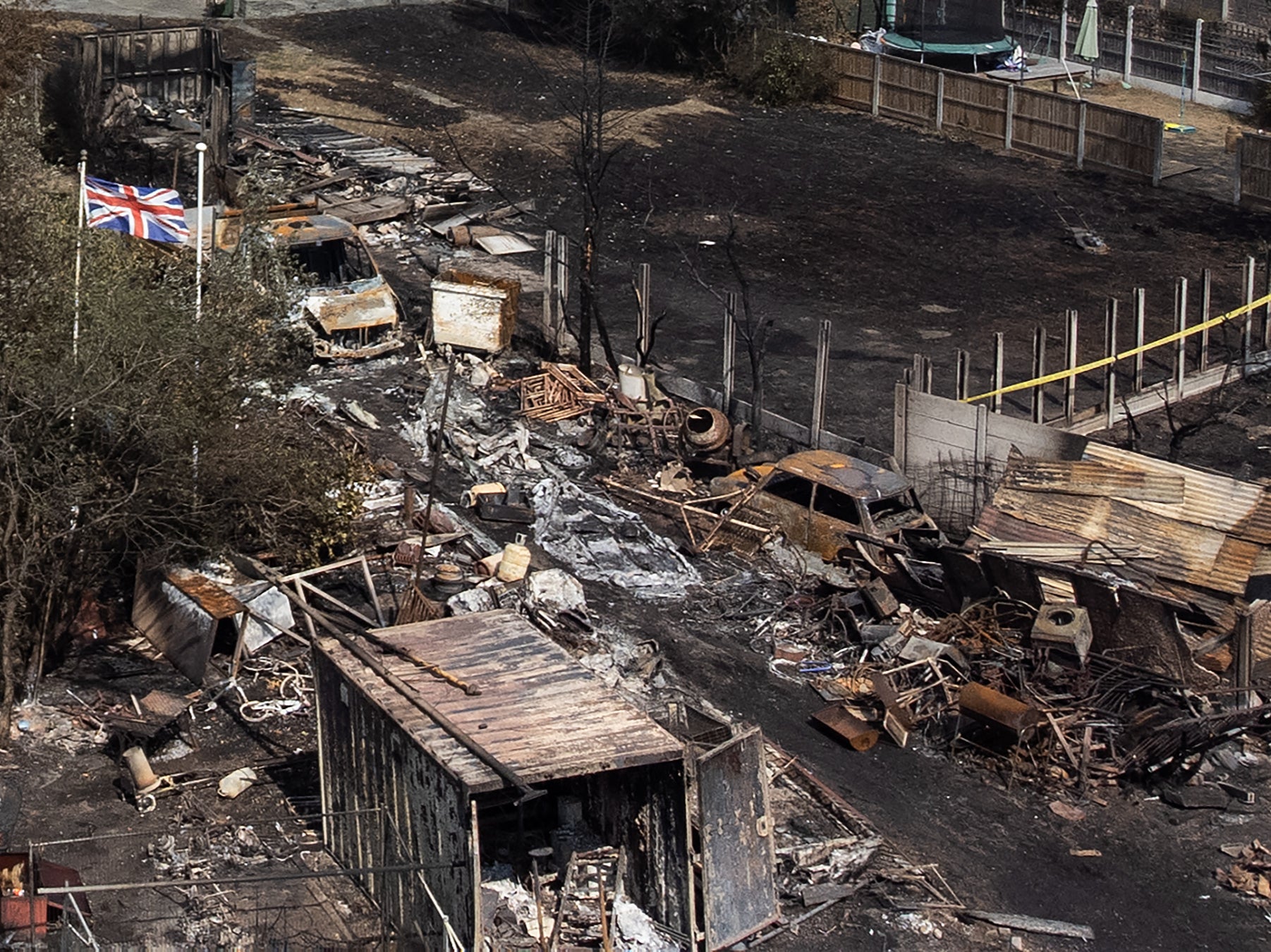 Residents speak of the moment a fire ripped through their homes in an east London village on the hottest day of the year