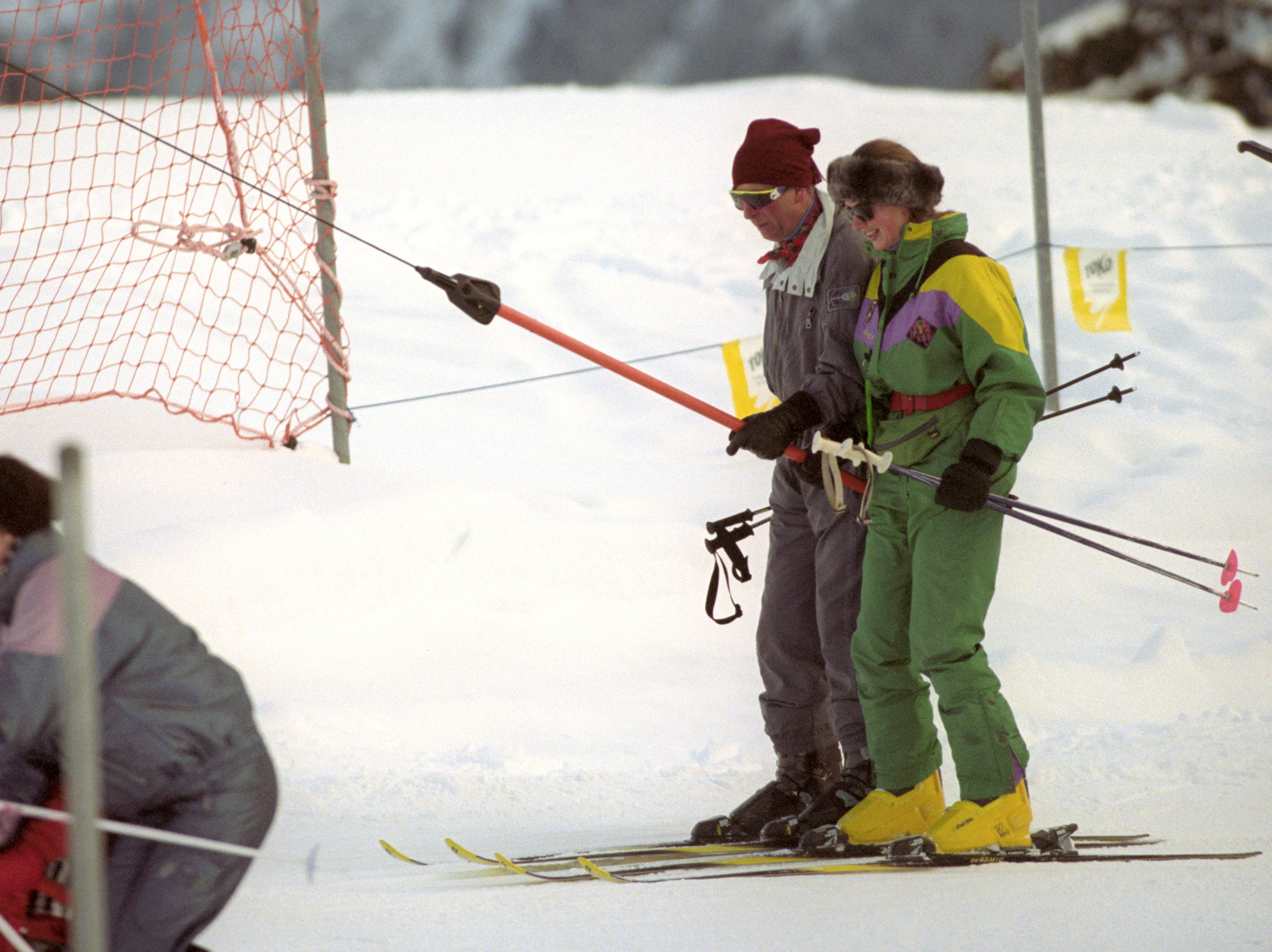 The Prince of Wales and personal assistant Tiggy Legge-Bourke hitch a ski lift together as they take to the Swiss ski slopes in Switzerland in 1996