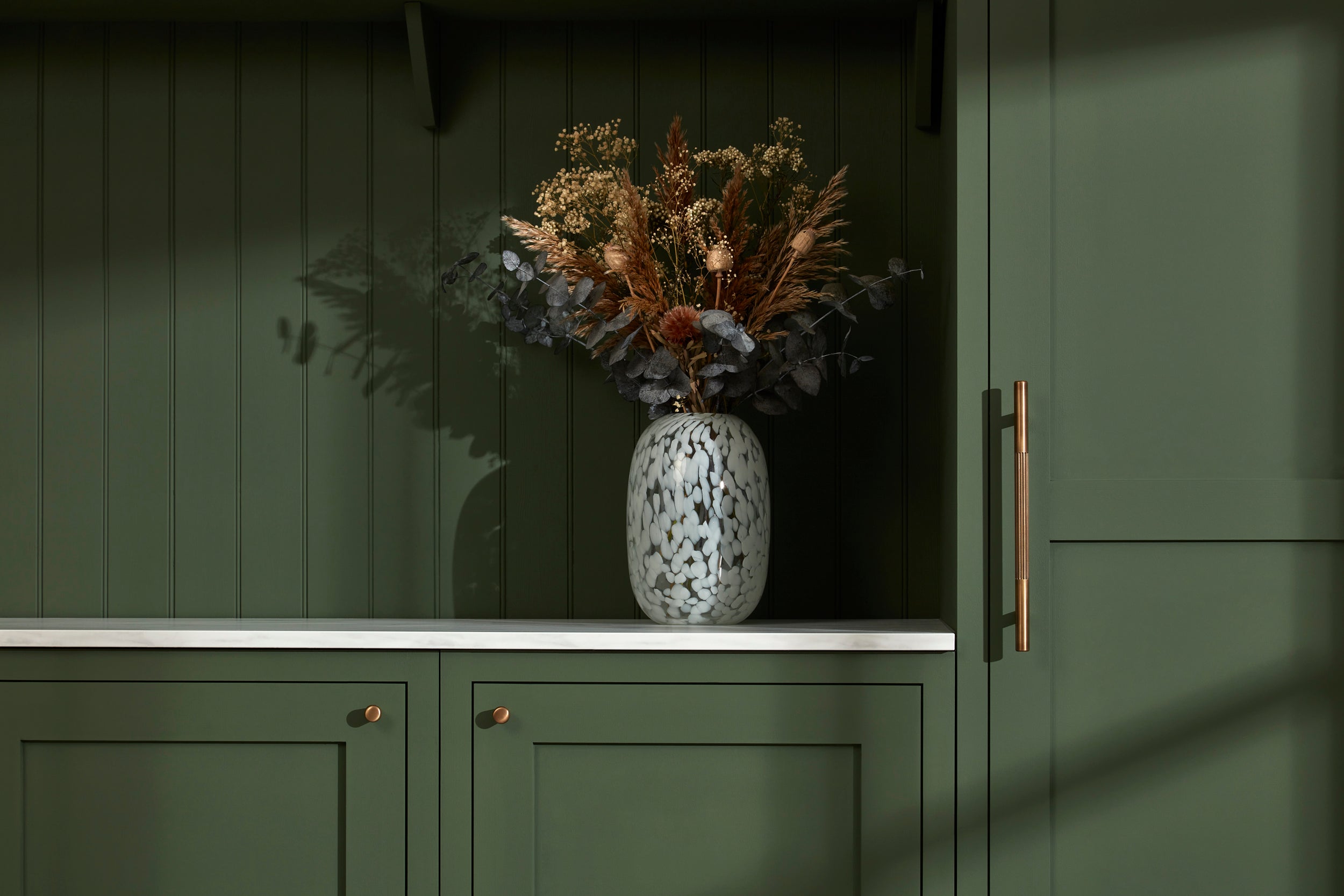 Repainting cupboards can transform your kitchen space