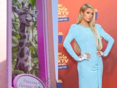 Paris Hilton names the Irwin family’s baby giraffe at Australia Zoo