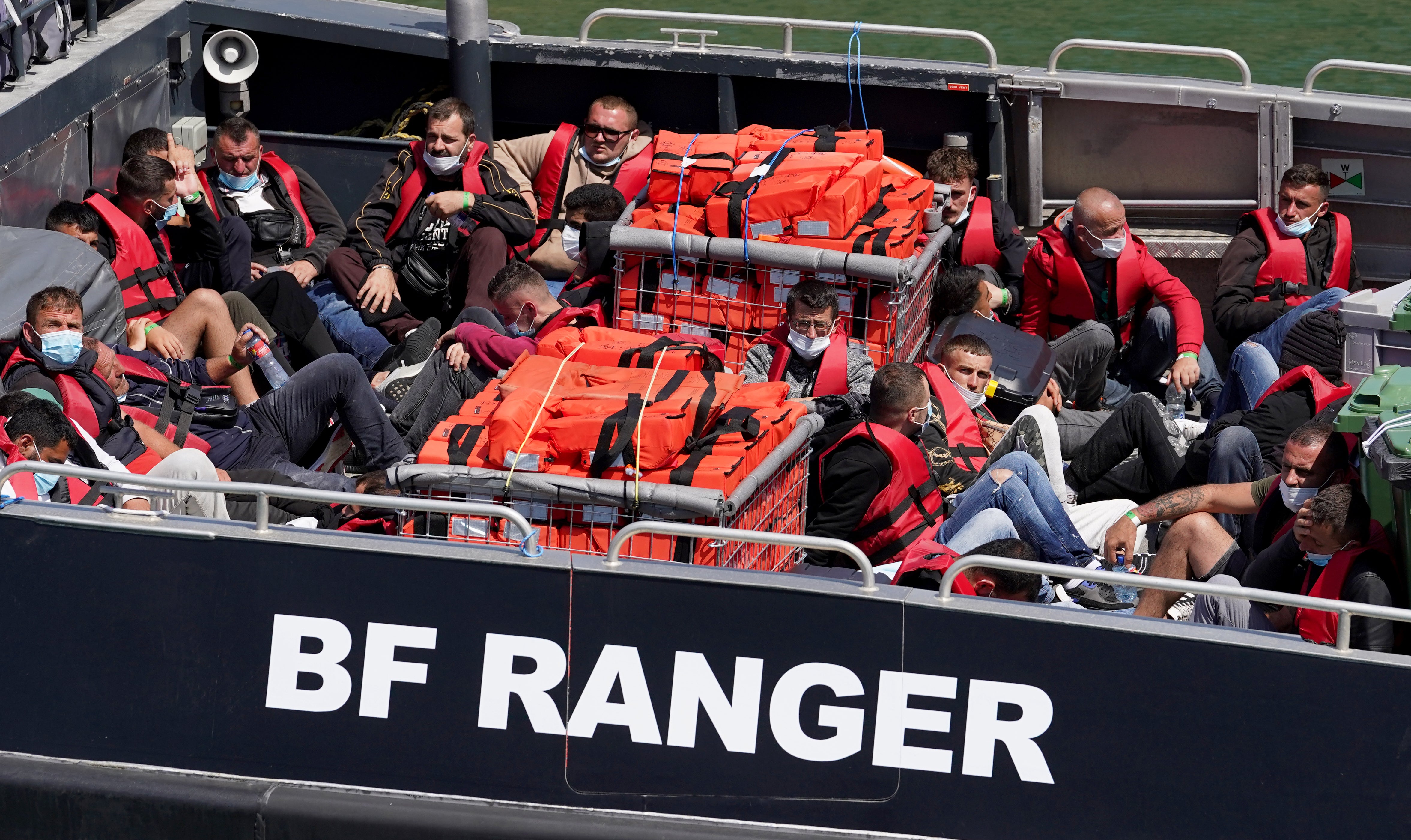 A group of people thought to be migrants are brought in to Dover, Kent (Gareth Fuller/PA)