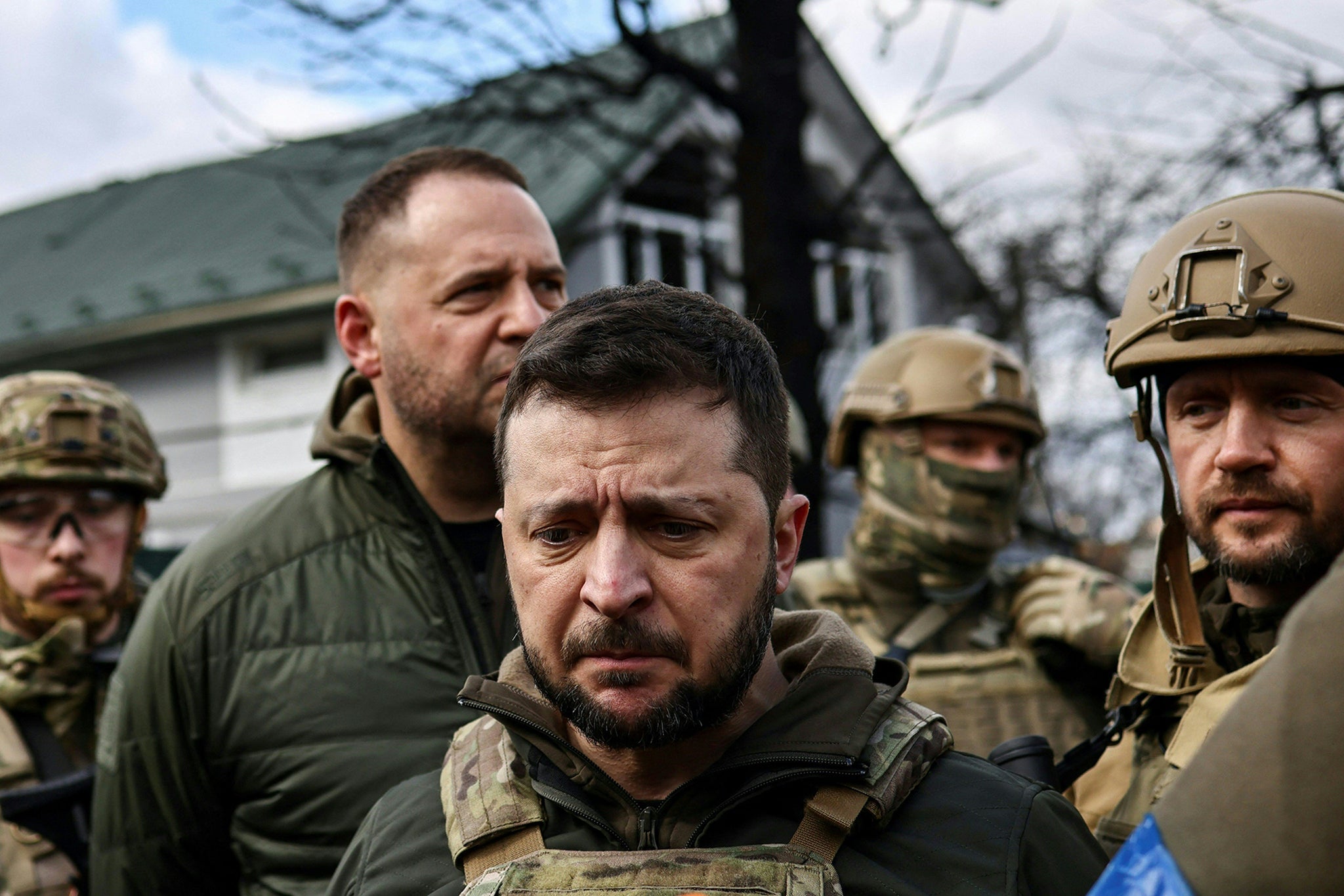 The president speaks to the media in the town of Bucha, northwest of Kyiv, in April