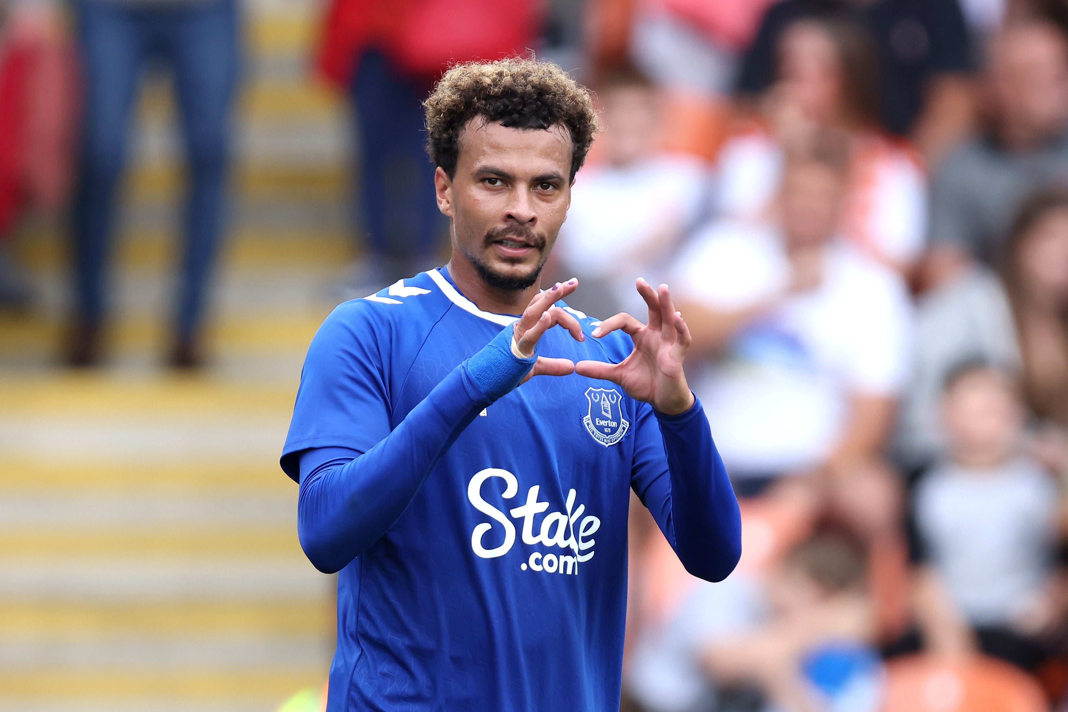 Dele Alli celebrates after scoring against Blackpool