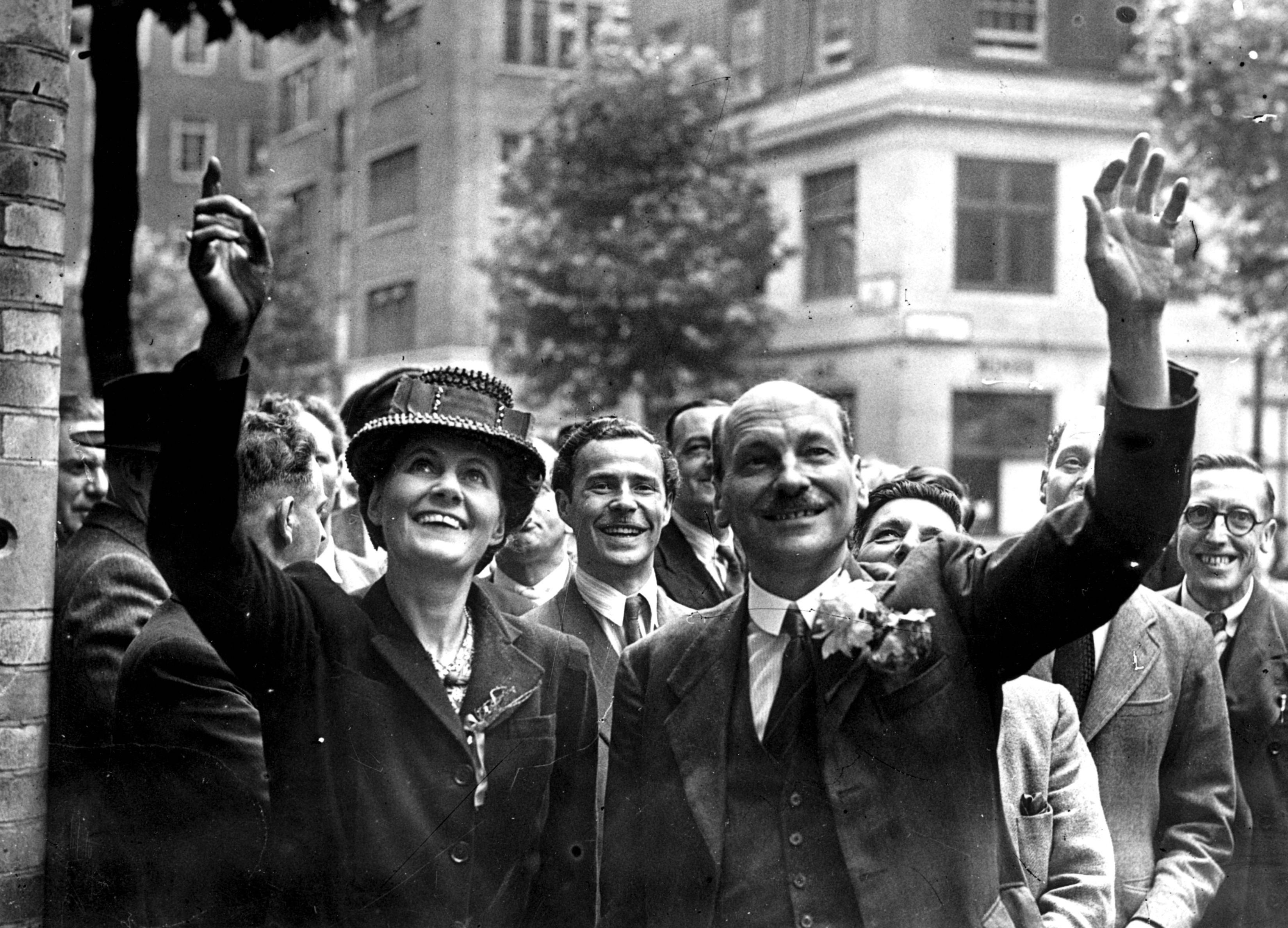 Clement Attlee and his wife Violet wave to crowds in London on 26 July 1945 – the day he became prime minister