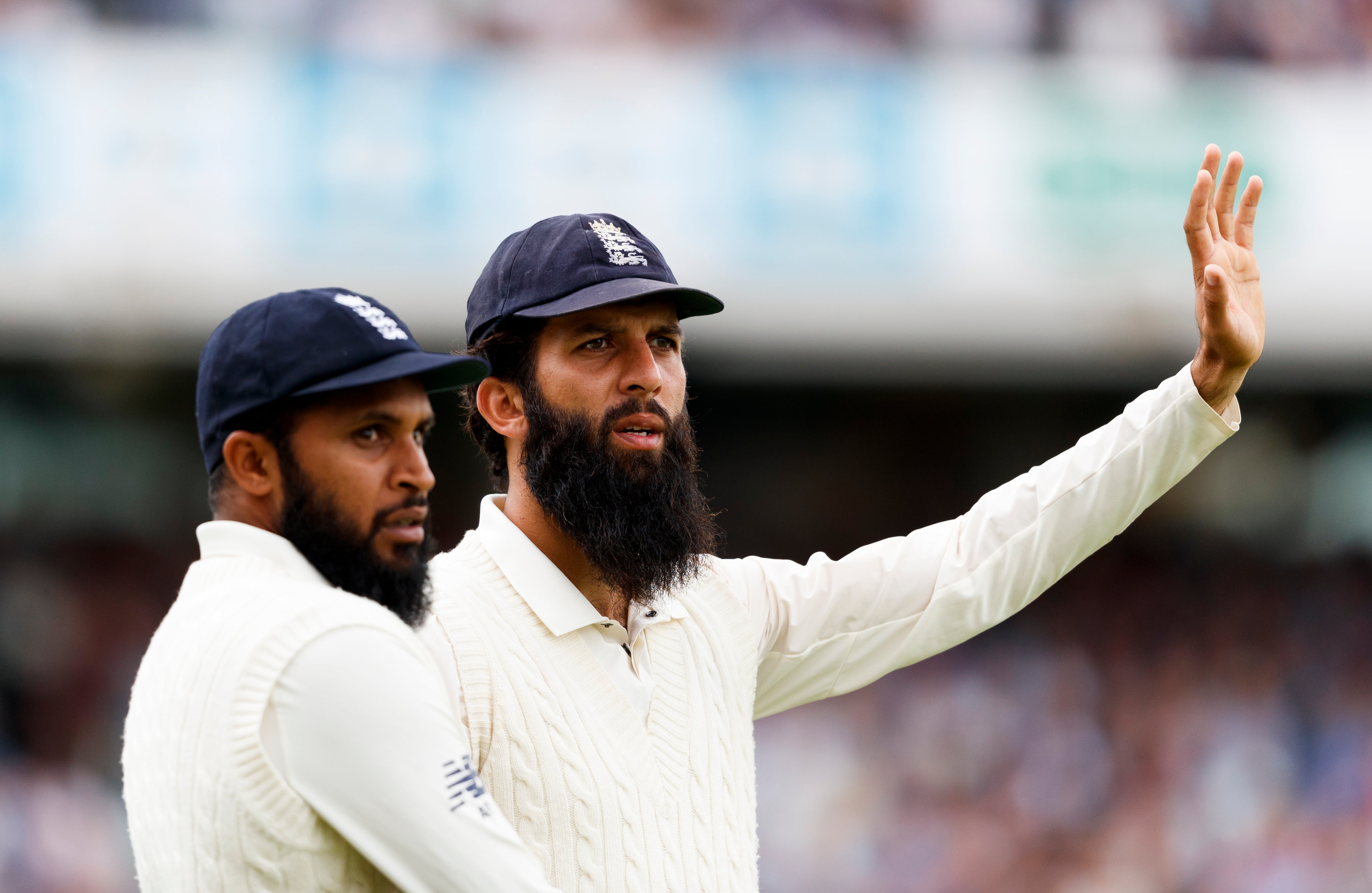 Moeen Ali (right) has made himself available for Test duty but Rashid (left) remains unconvinced (John Walton/PA)