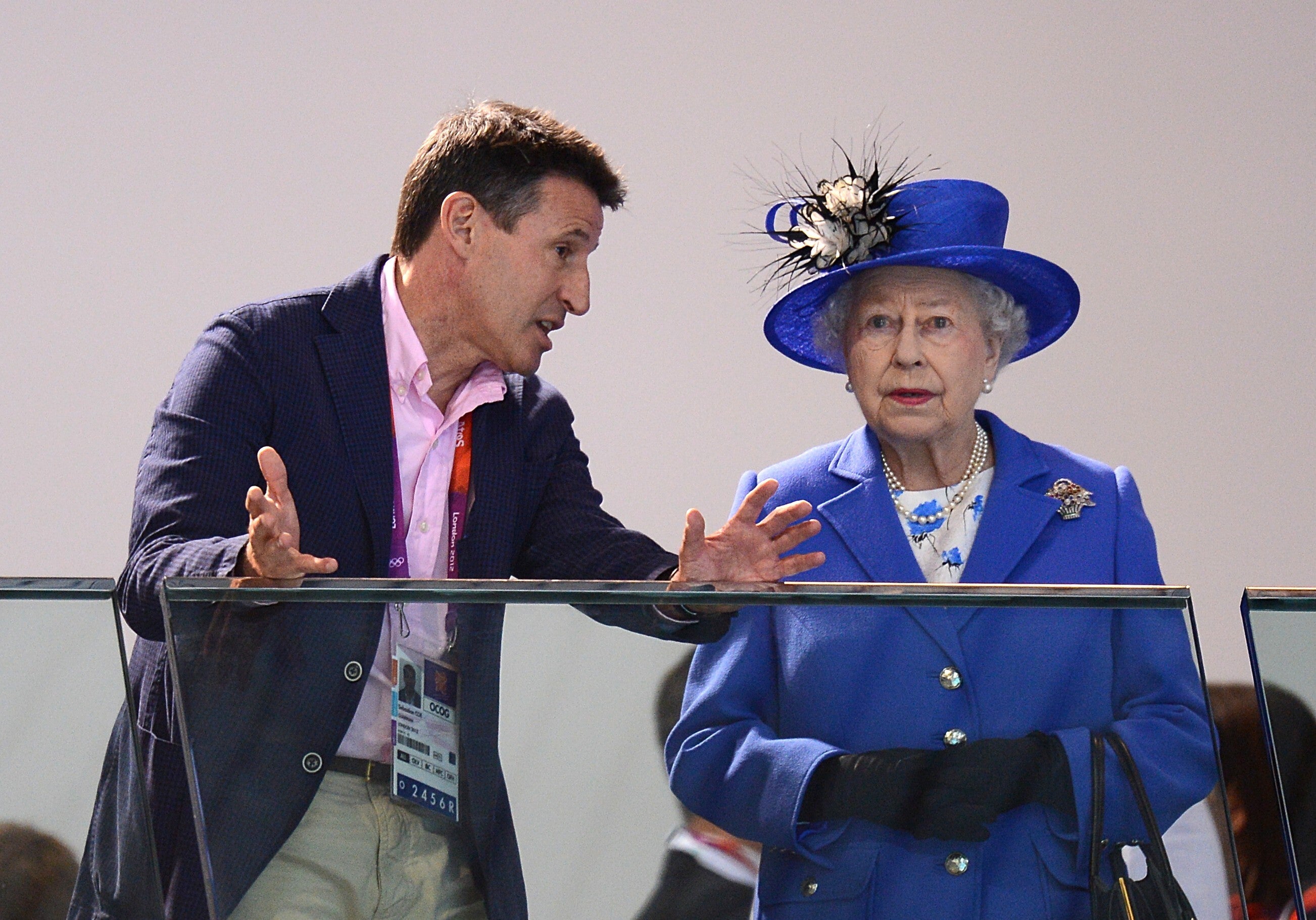 Lord Coe speaking to The Queen at the Aquatics Centre on day one of the London 2012 Olympics (Tony Marshall/PA)