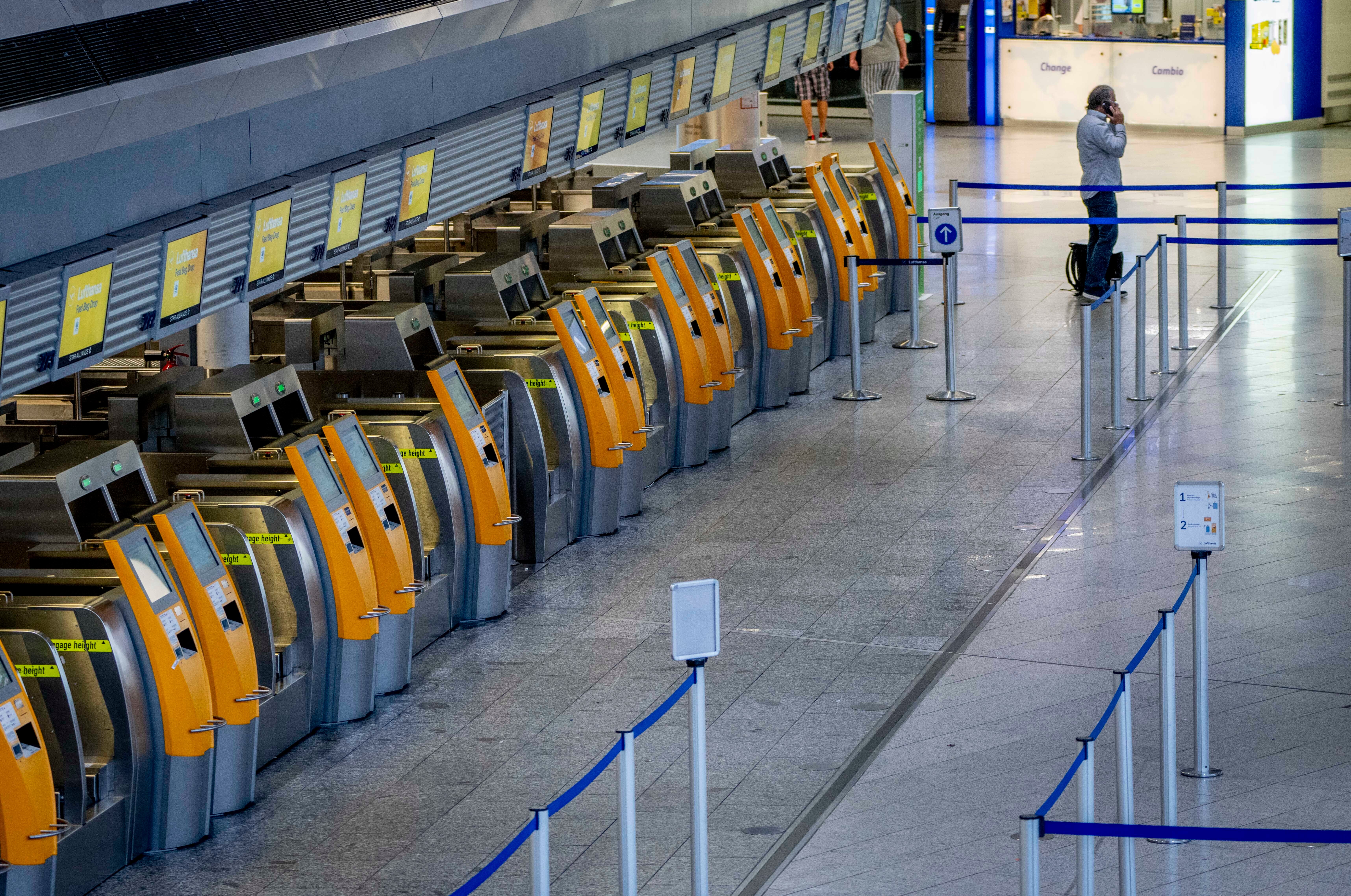 Empty Lufthansa check-in counters at Frankfurt international airport