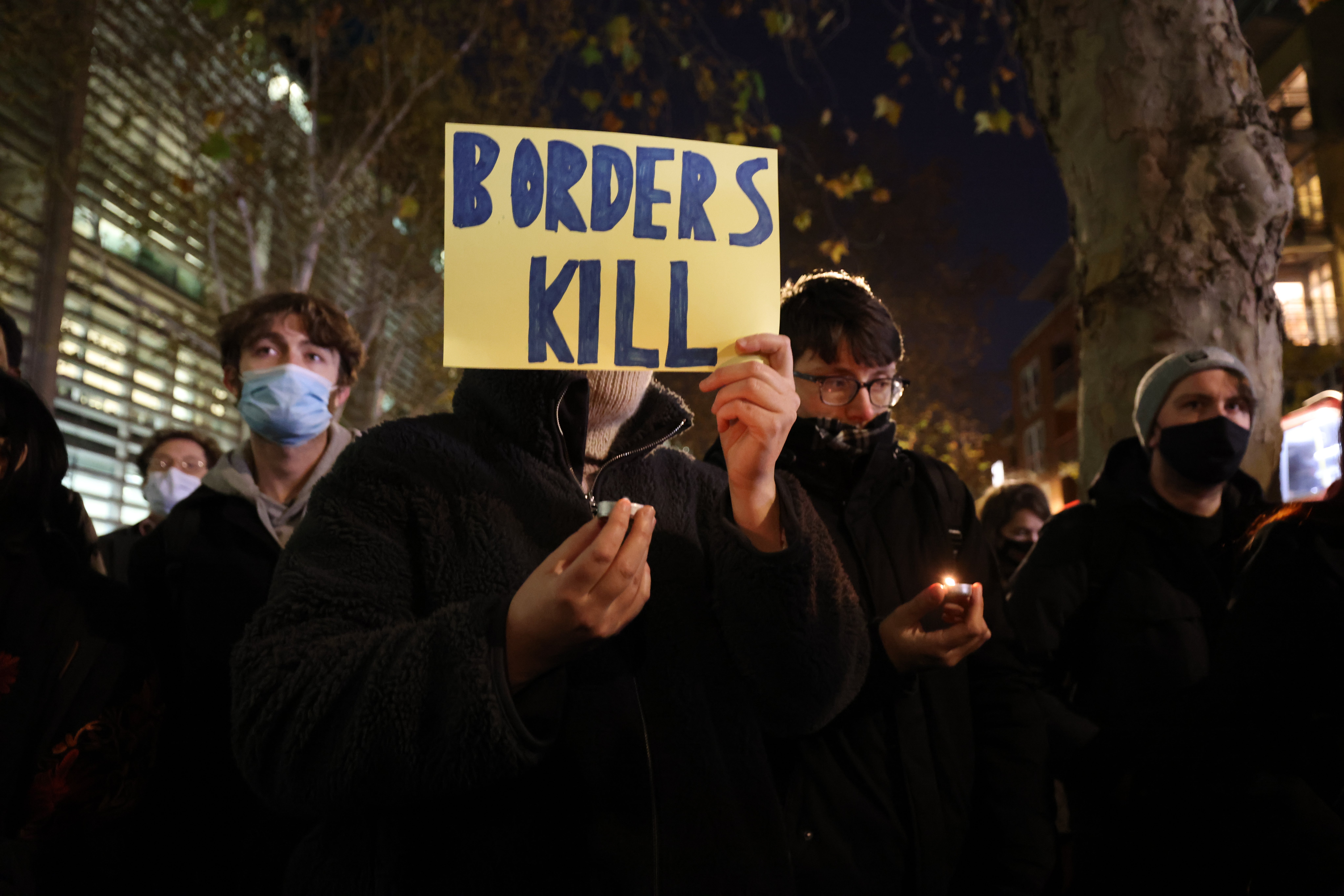 People take part in a protest outside the Home Office in Westminster, London, after 27 people drowned in the Channel last November.