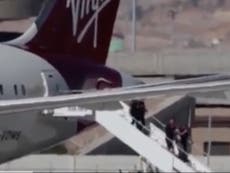 London to LA flight makes emergency landing after man tries to ‘kick out windows’