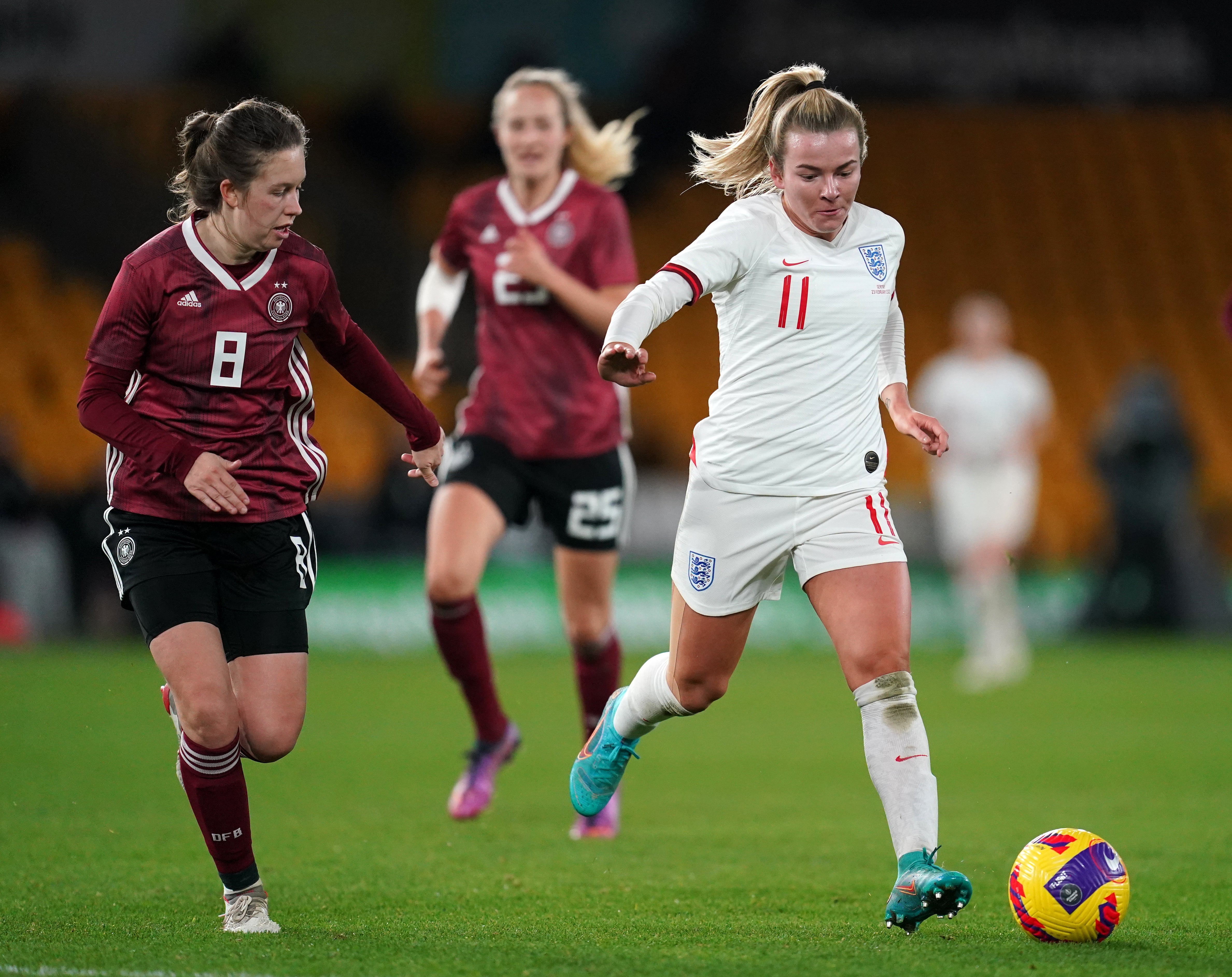 Germany’s Jana Feldkamp, left, and England’s Lauren Hemp battle for the ball (PA)