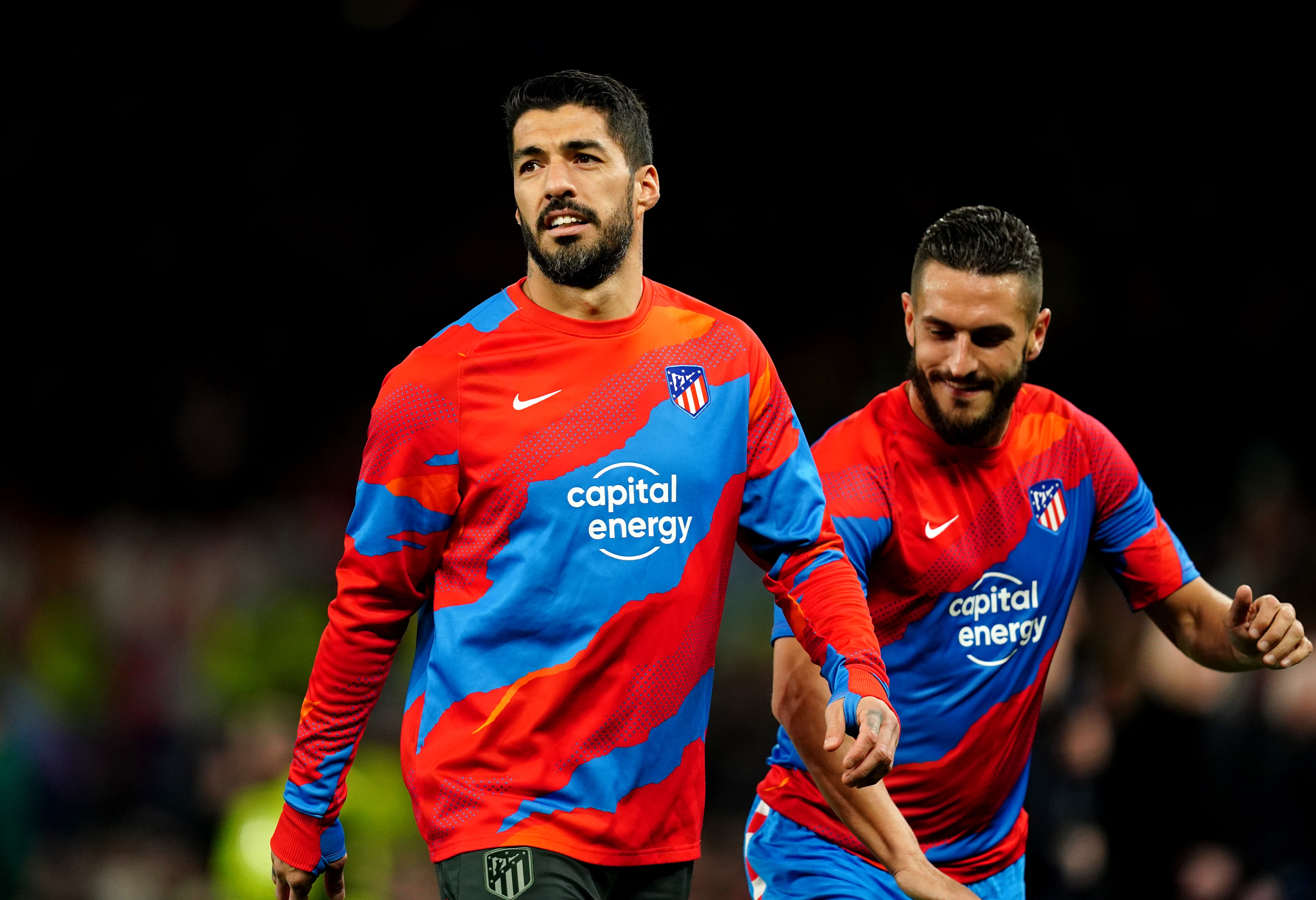 Luis Suarez warms up prior to the UEFA Champions League round of sixteen second leg match at Old Trafford in March (Martin Rickett/PA)