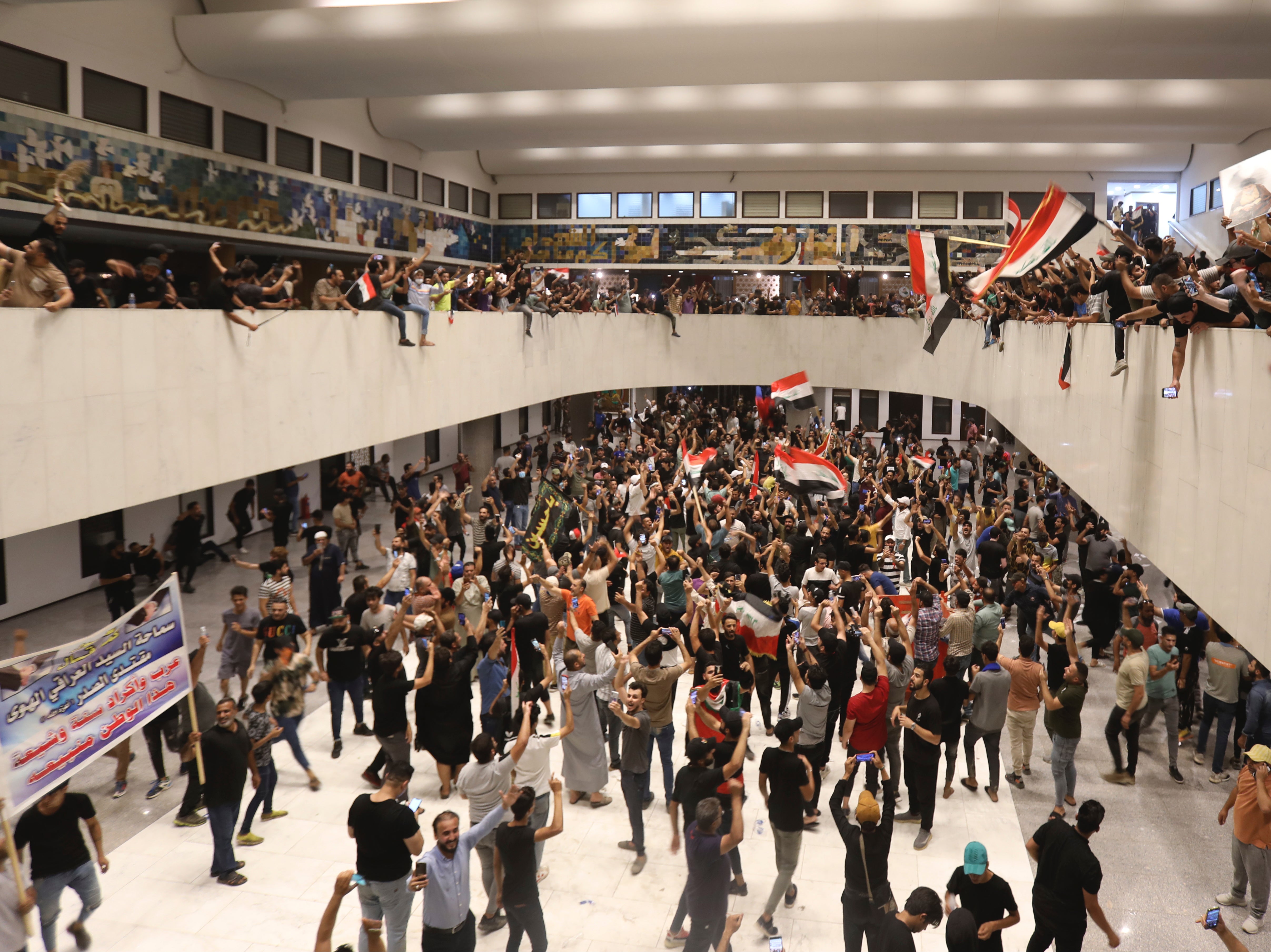 Muqtada al-Sadr’s supporters waved Iraqi flags and chanted anti-Iran slogans