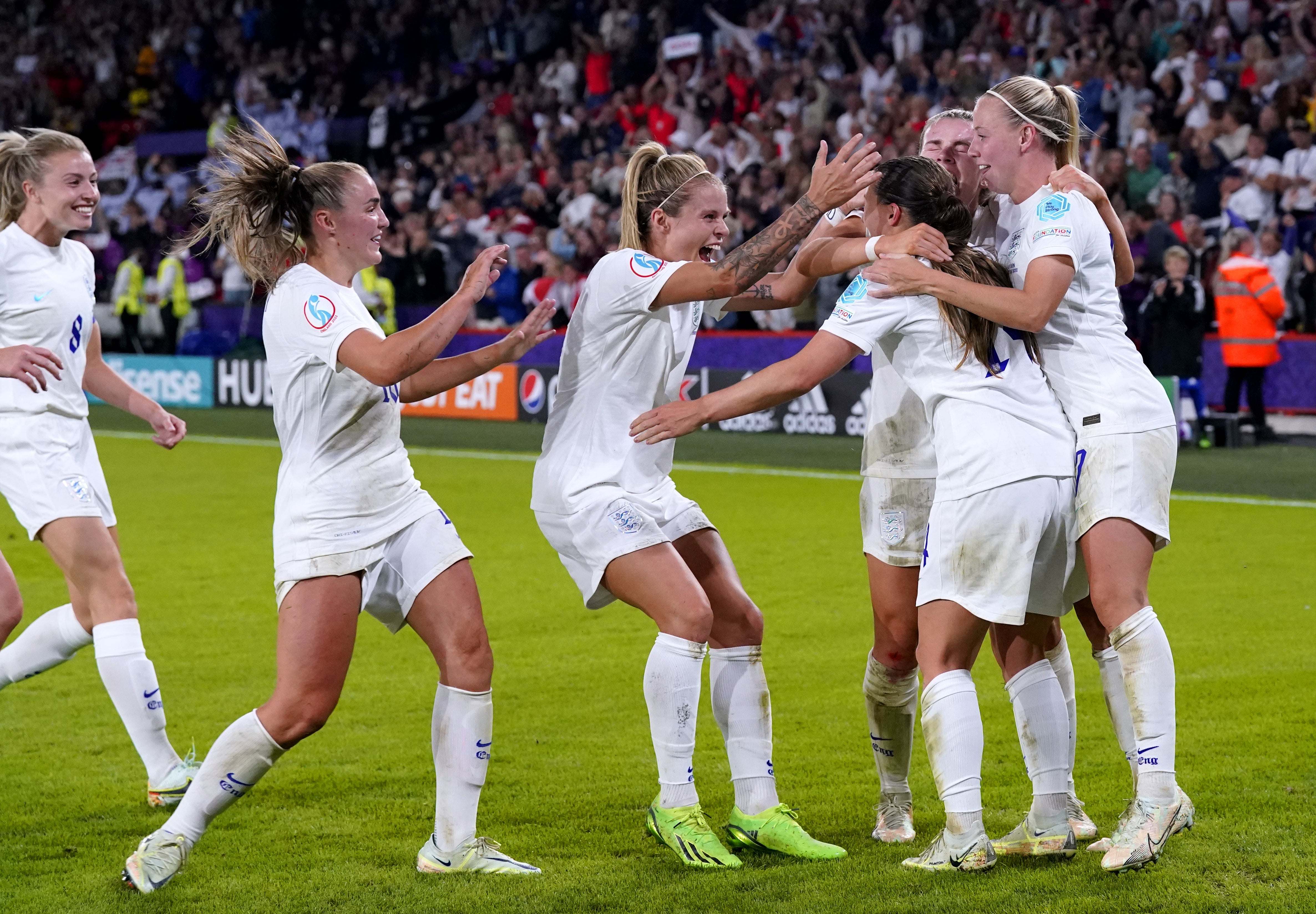 England players celebrate Kirby’s goal during the semi-final win over Sweden