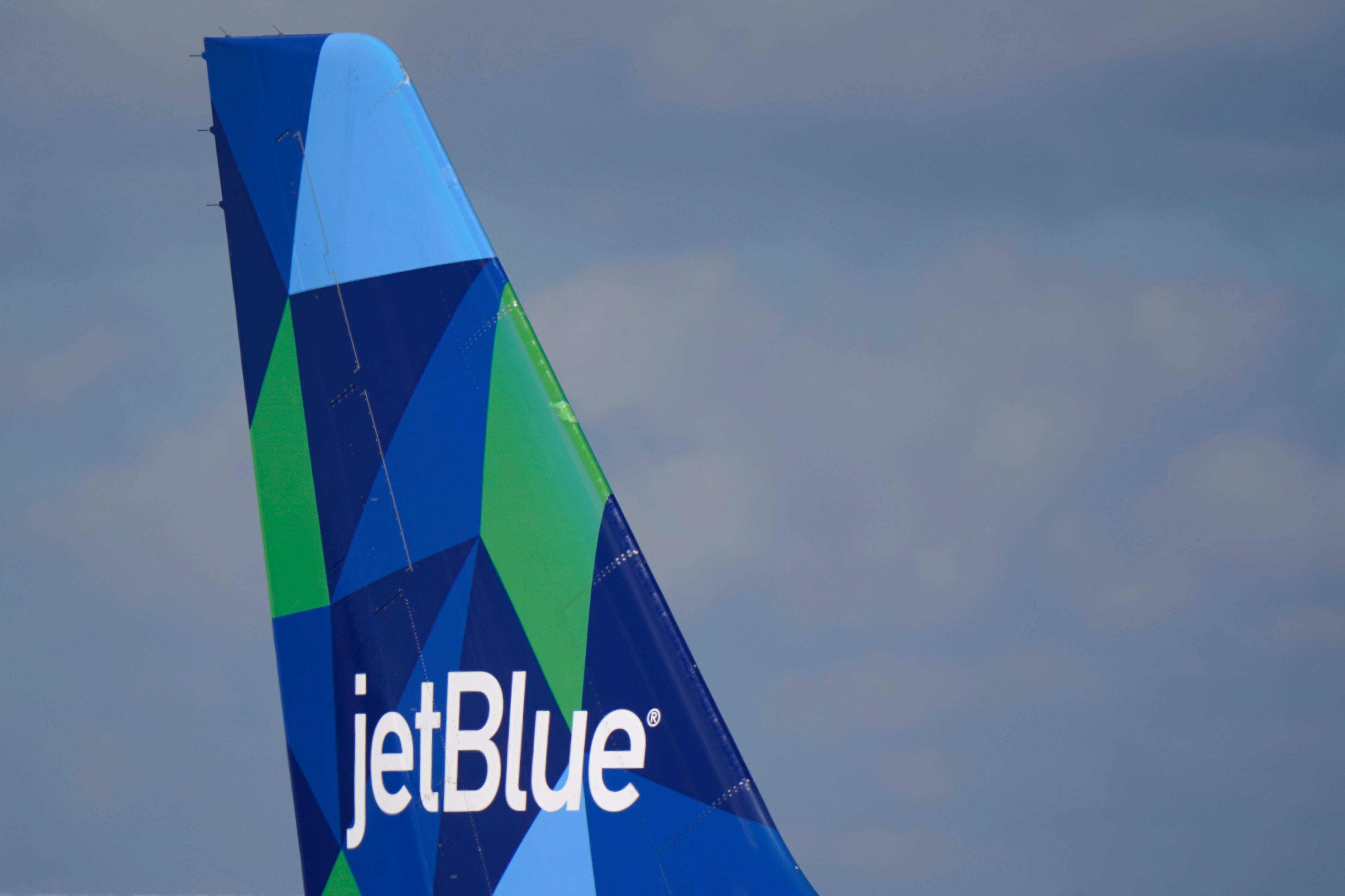 The tail of JetBlue Airbus A321 at Fort Lauderdale airport. A deal with Spirit Airlines was announced on Thursday.