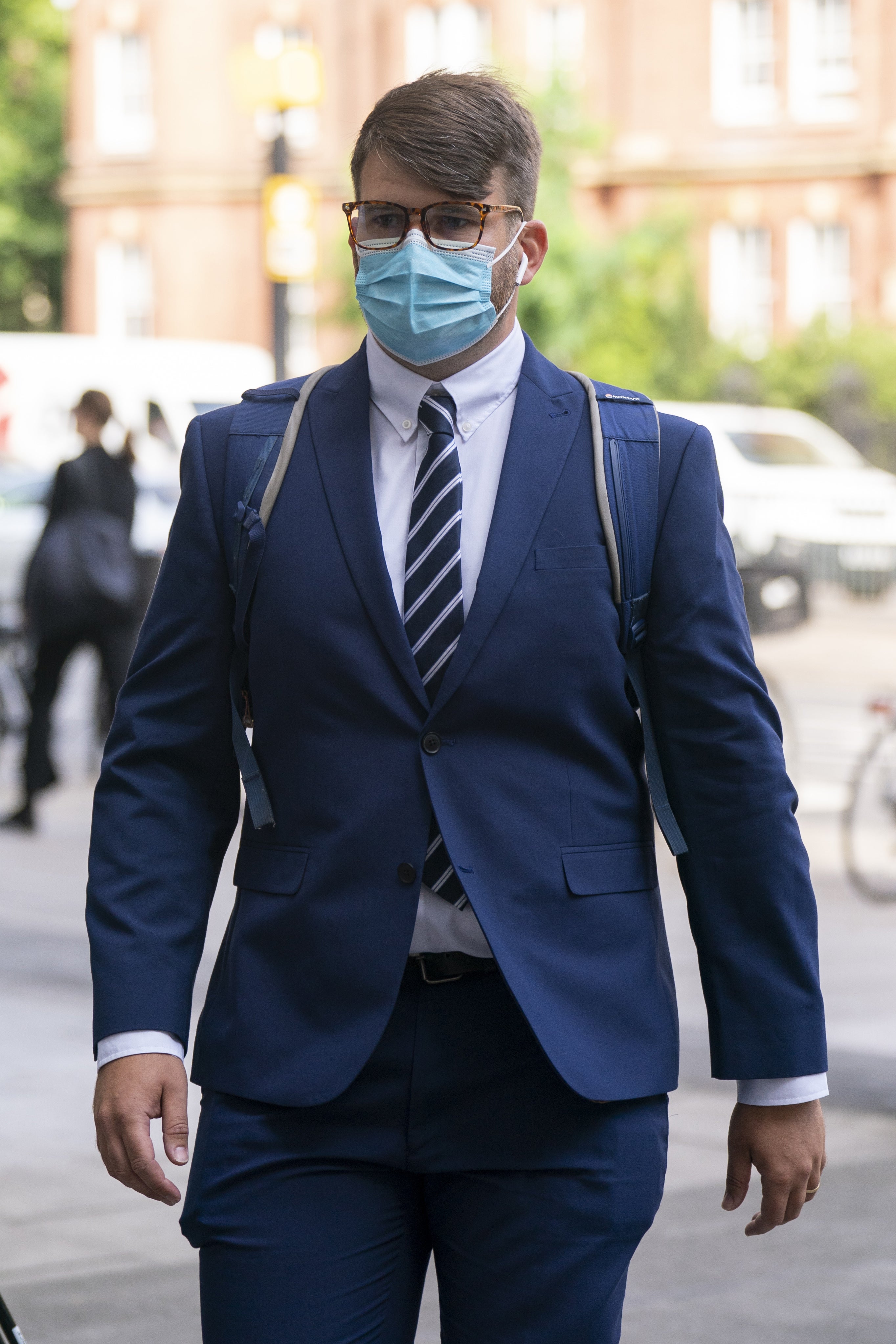 Serving Metropolitan Police Pc William Neville arriving at Westminster Magistrates’ Court, London, where he is charged with sharing “grossly offensive” WhatsApp messages with Sarah Everard murderer Wayne Couzens. Picture date: Thursday July 28, 2022.