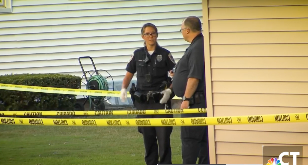 Police outside a Danbury home where a mother and three children died in what police say was a murder-suicide