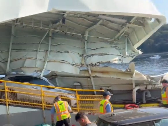 The damaged front deck of a ferry that crashed into a dock in Fauntleroy, West Seattle, in Washington.