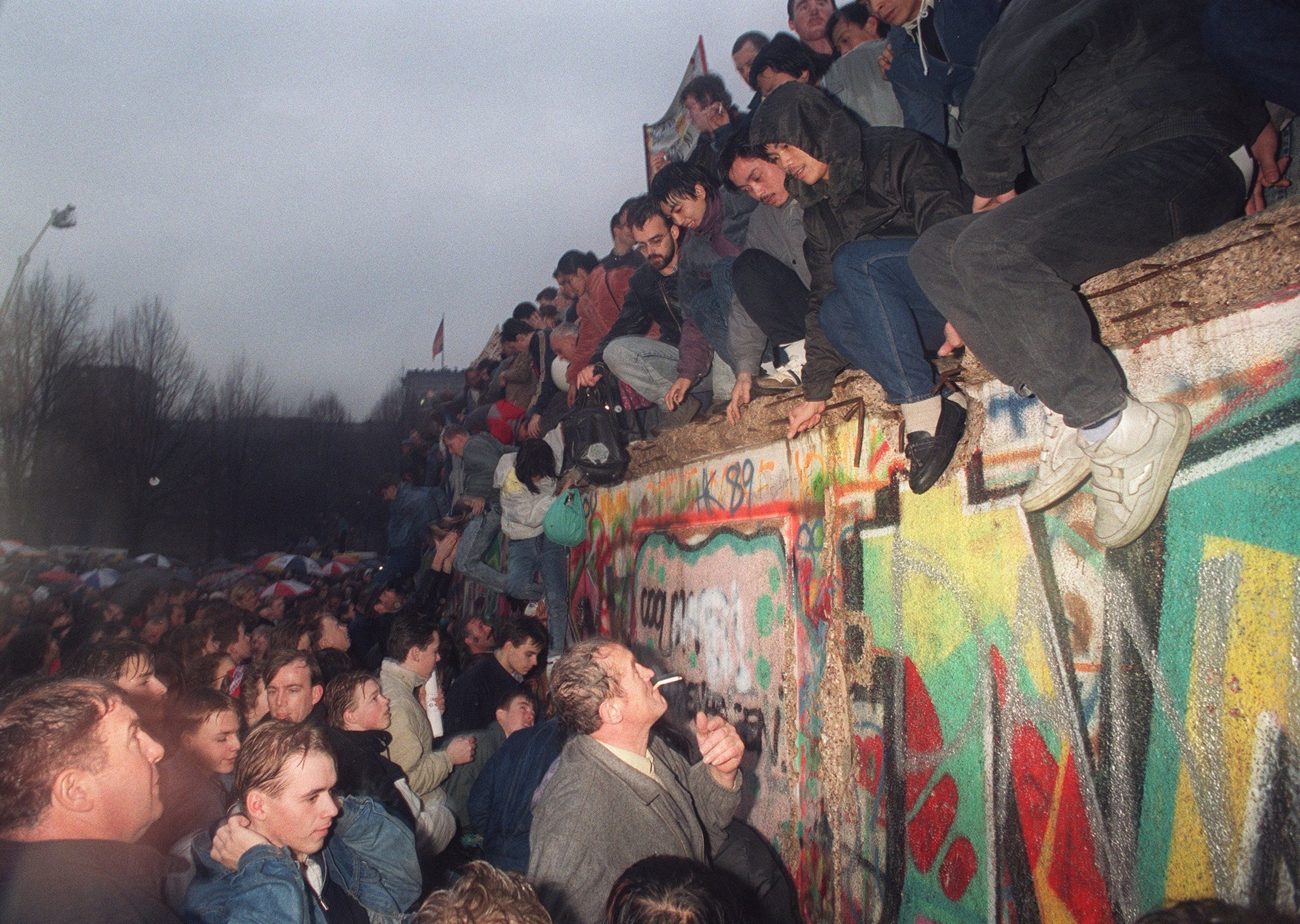 People from East Germany greet citizens of West Germany at the Brandenburg Gate in Berlin, December 1989