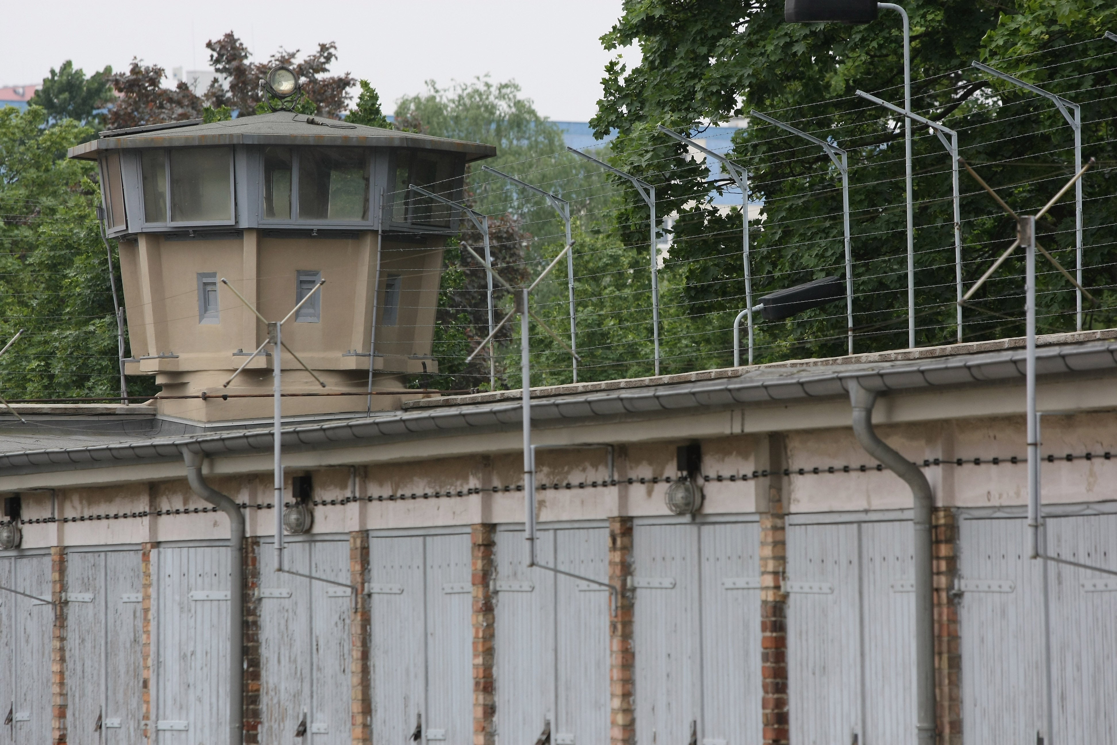 A guard tower stands at the former prison of the East German, communist-era secret police, known as the Stasi