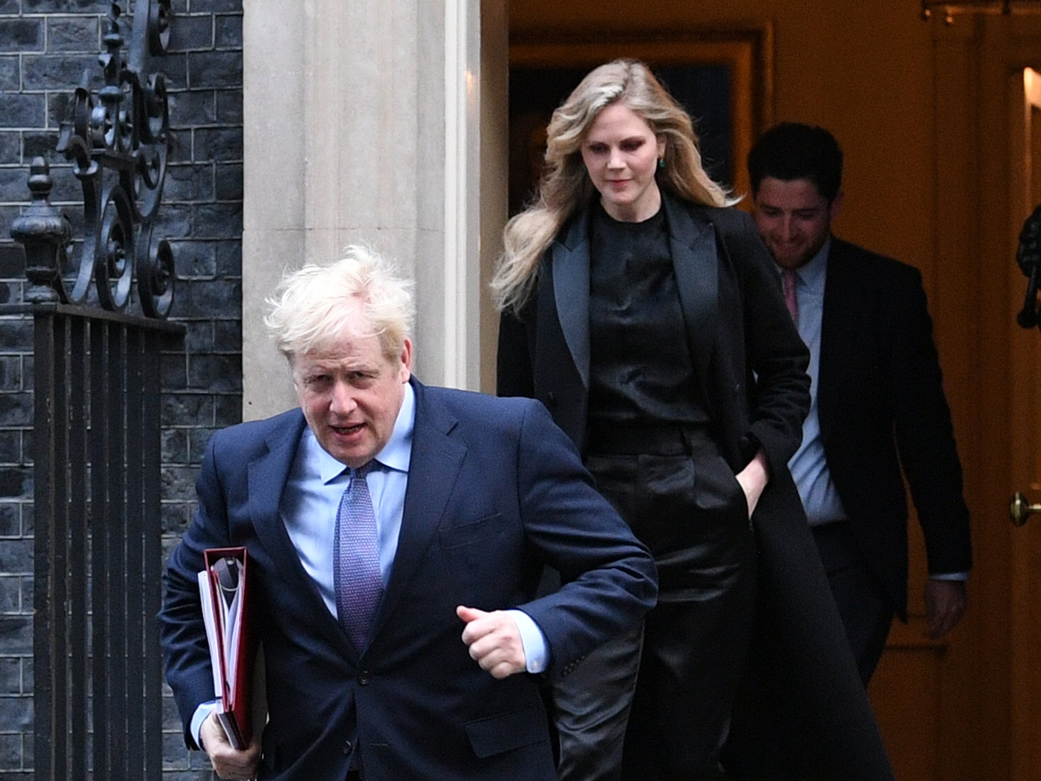 Boris Johnson and Cleo Watson leave Downing Street in October 2020