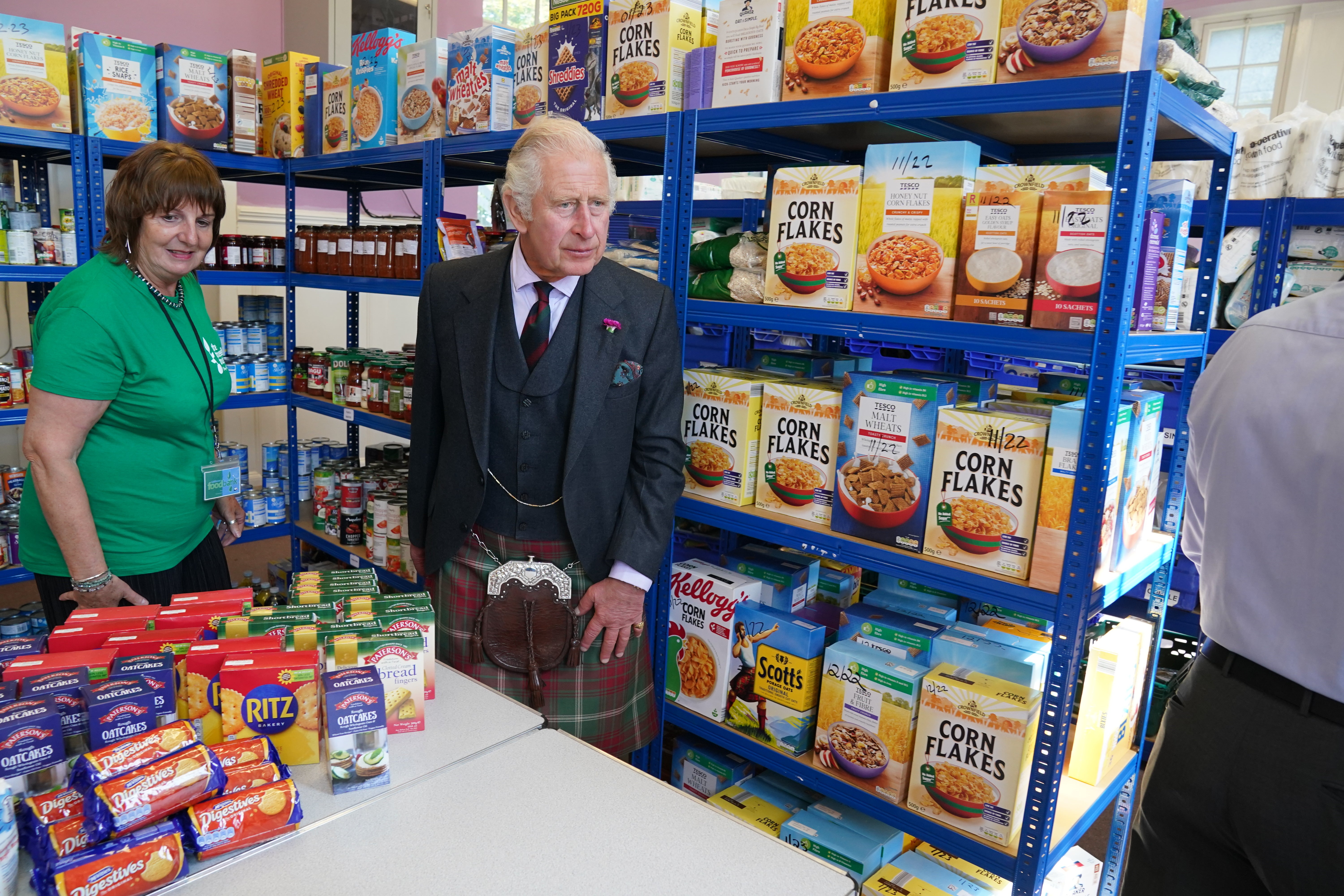 The Prince of Wales, known as the Duke of Rothesay when in Scotland, meets volunteers and supporters of Caithness food bank at Carnegie Library in Wick, to hear more about the vital support they provide to those in need in Caithness and Sutherland through the provision of food and other essentials. Picture date: Friday July 29, 2022 (Andrew Milligan/PA)