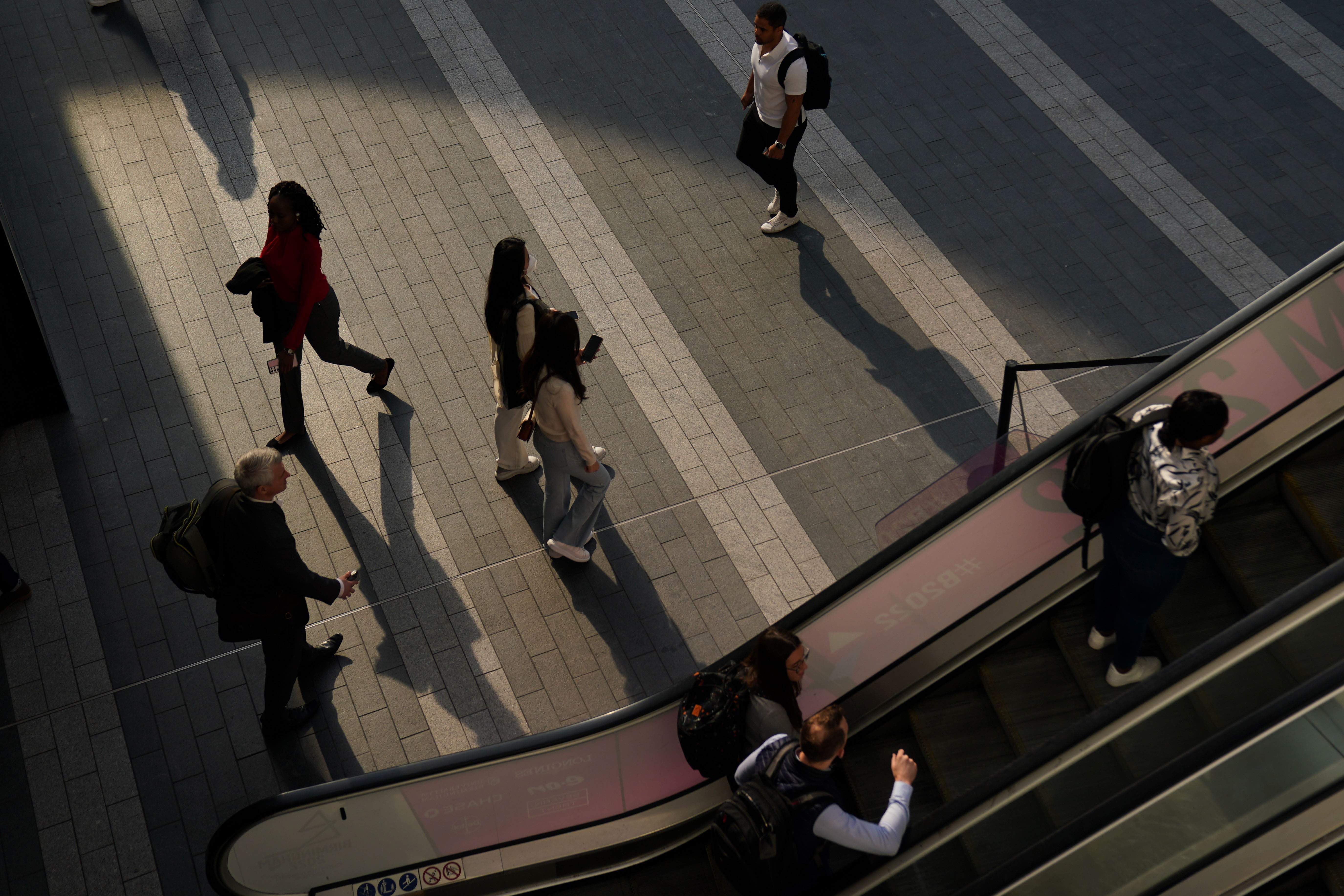 Passengers at Birmingham New Street Station (Jacob King/PA)