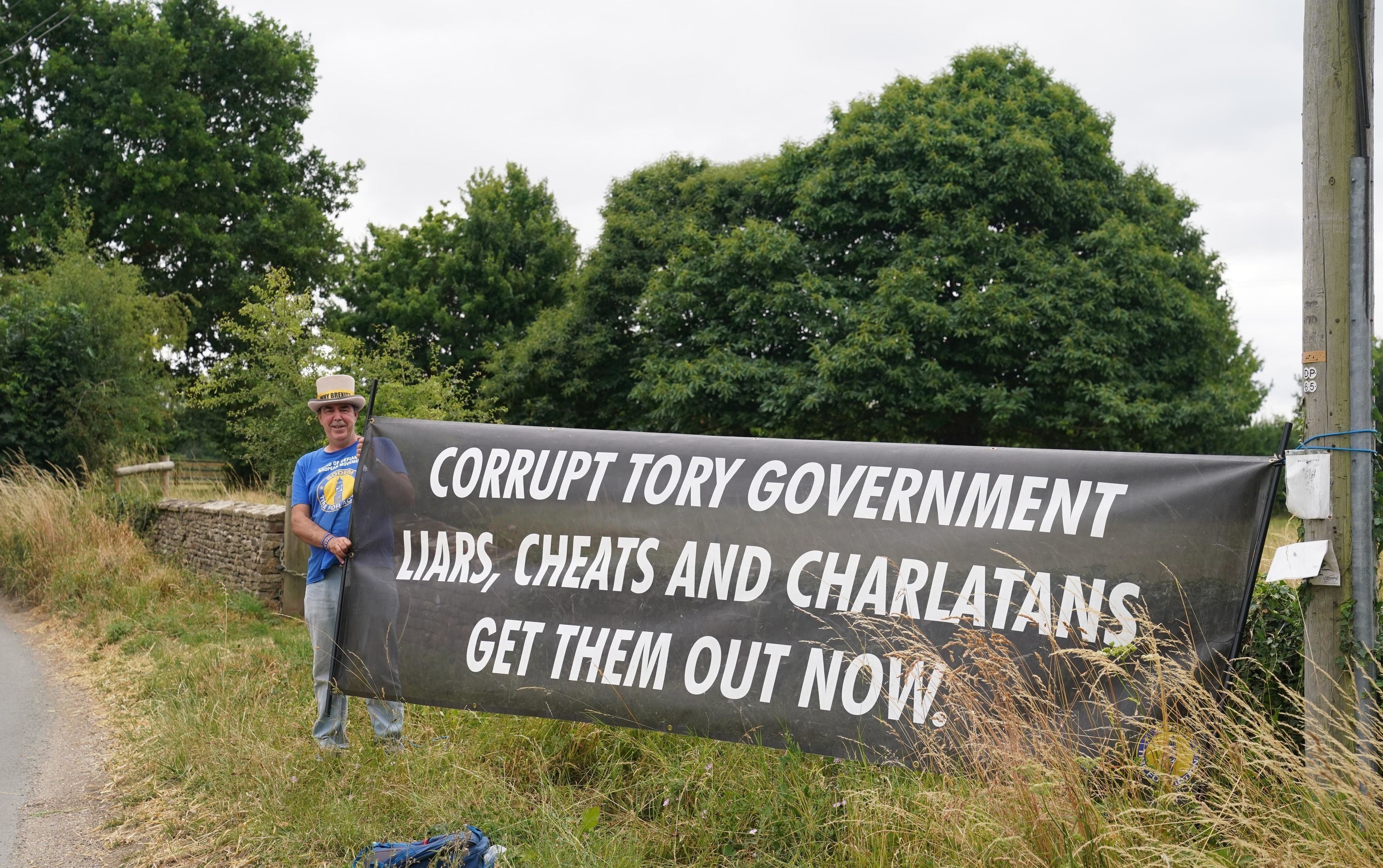 Brexit protester Steve Bray was spotted with an anti-Tory banner outside the venue